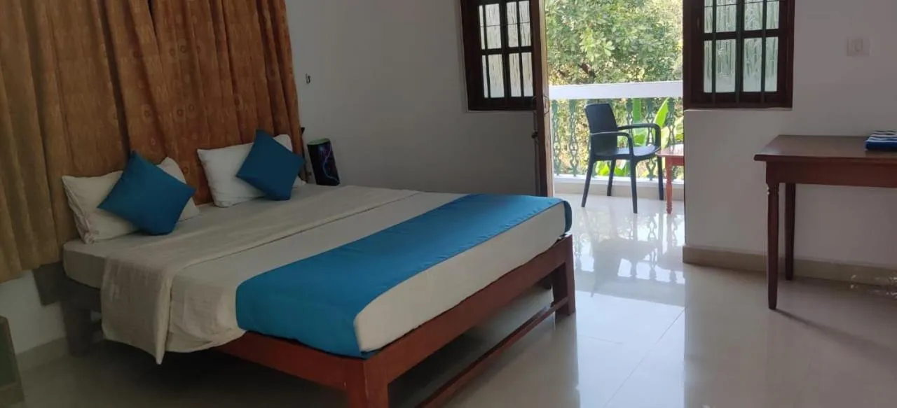 Bed in Pebbles Guesthouse