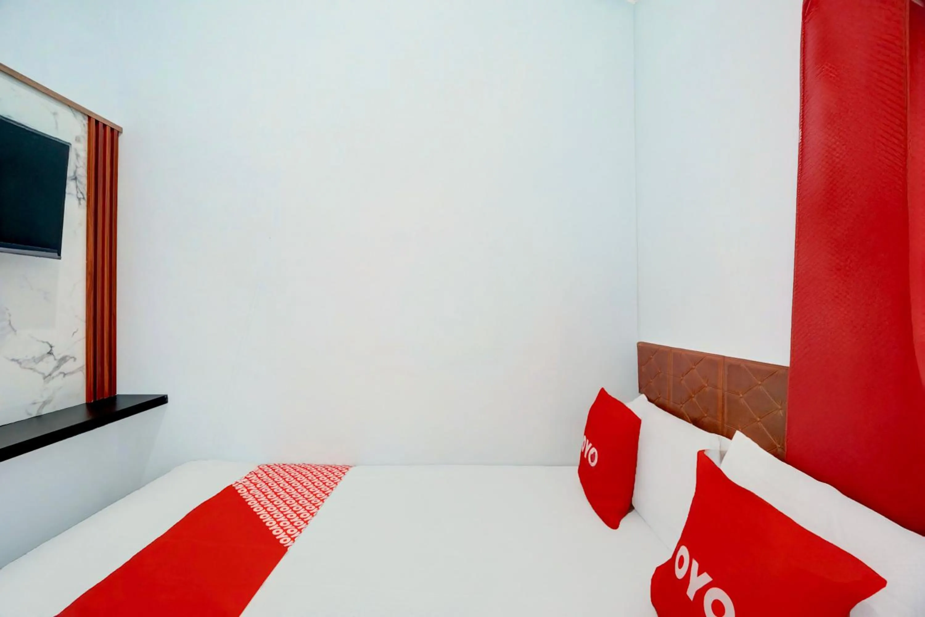 Bedroom in Hotel O MIOXIO Syariah Kost