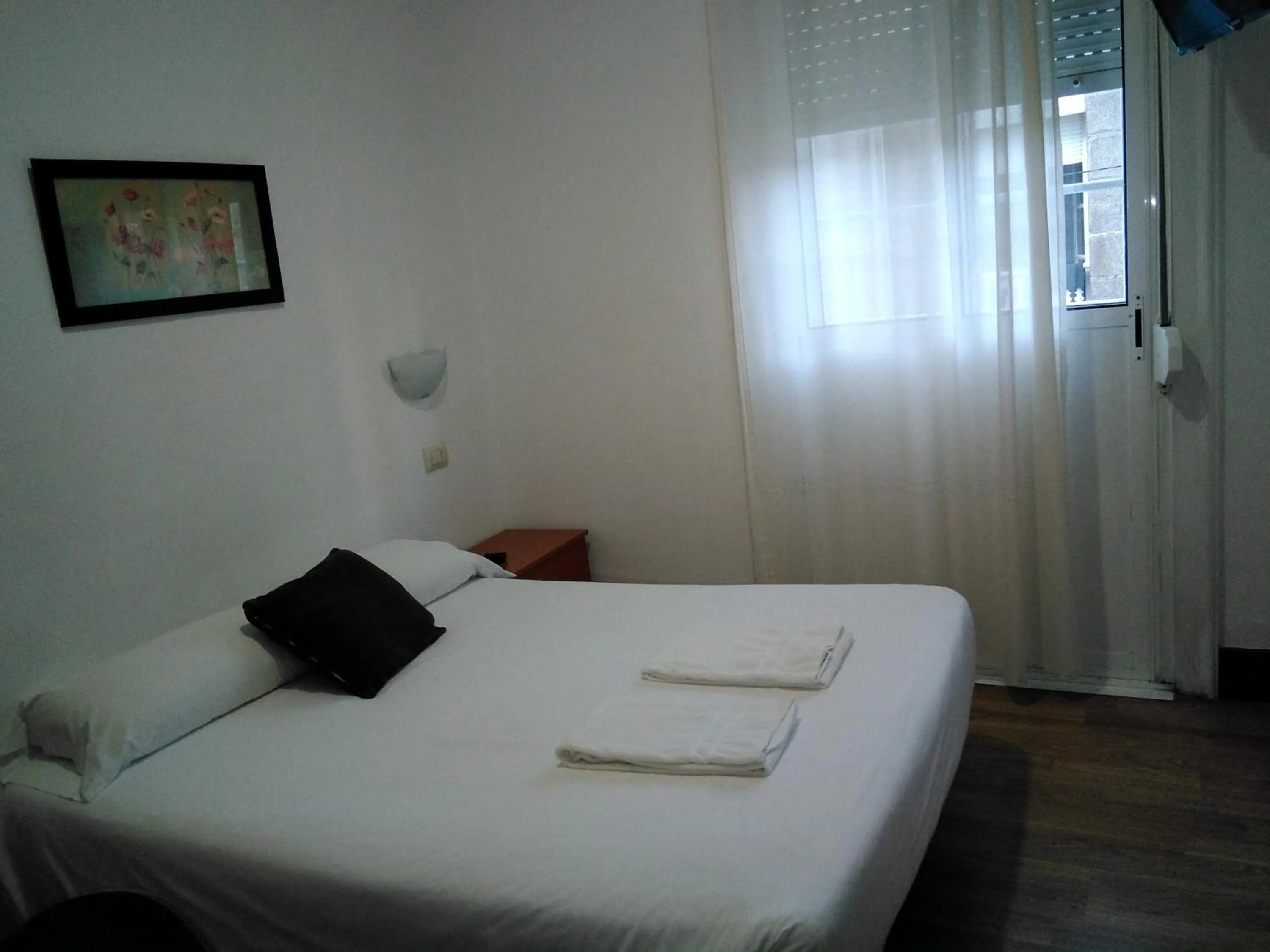 Bed in Hostal Ancla Dorada