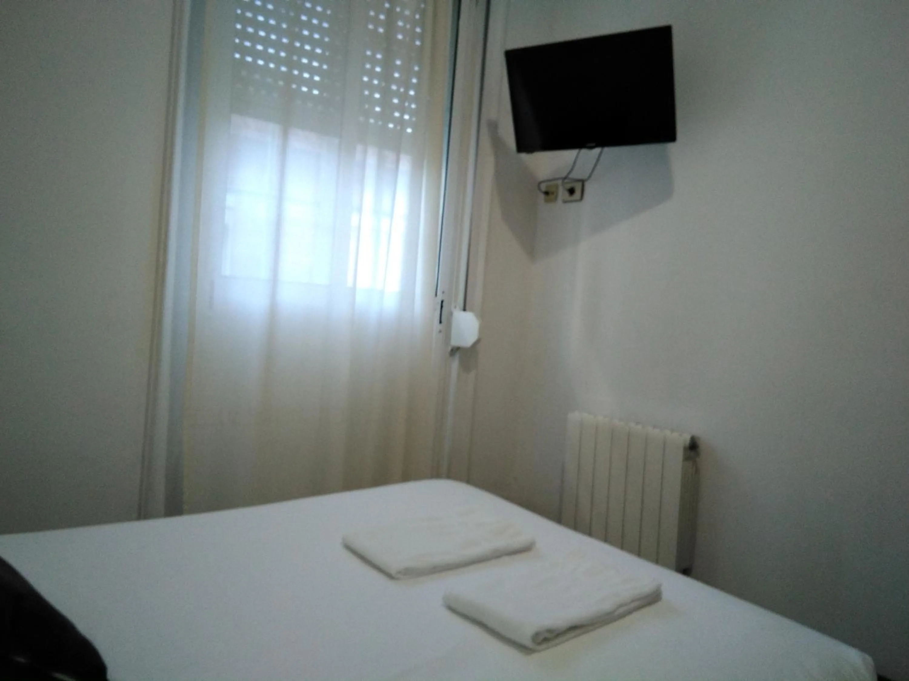 Bed in Hostal Ancla Dorada