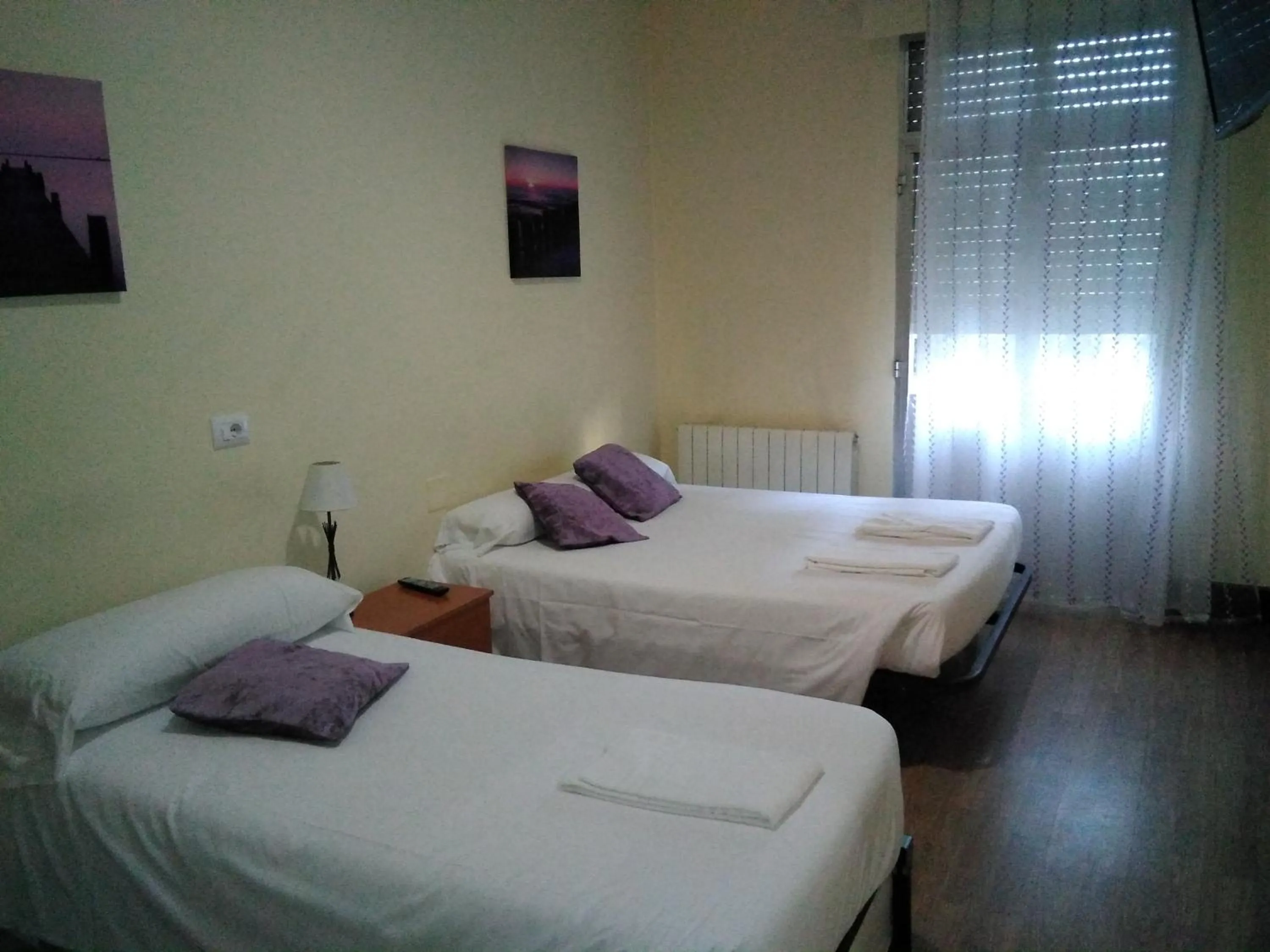 Bed in Hostal Ancla Dorada