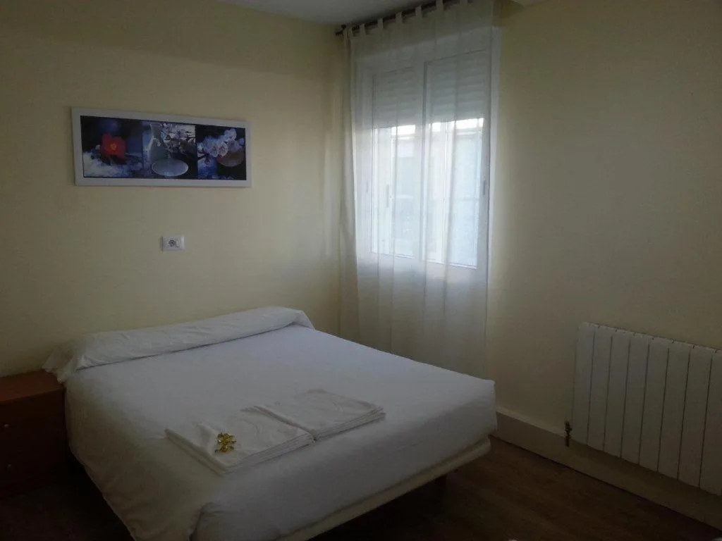 Bed in Hostal Ancla Dorada