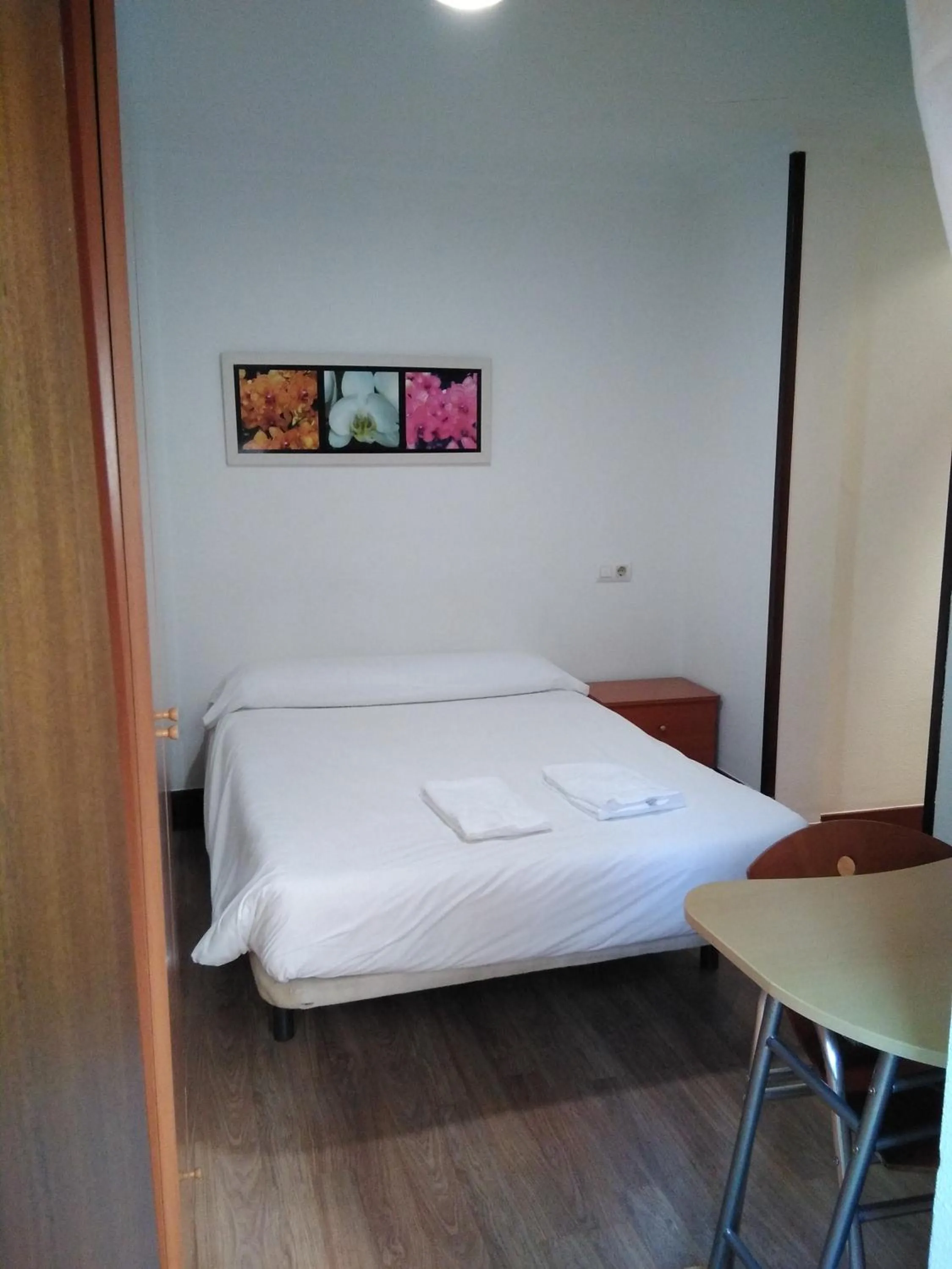 Bed in Hostal Ancla Dorada