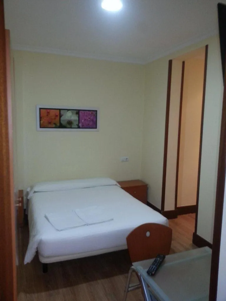 Bed in Hostal Ancla Dorada