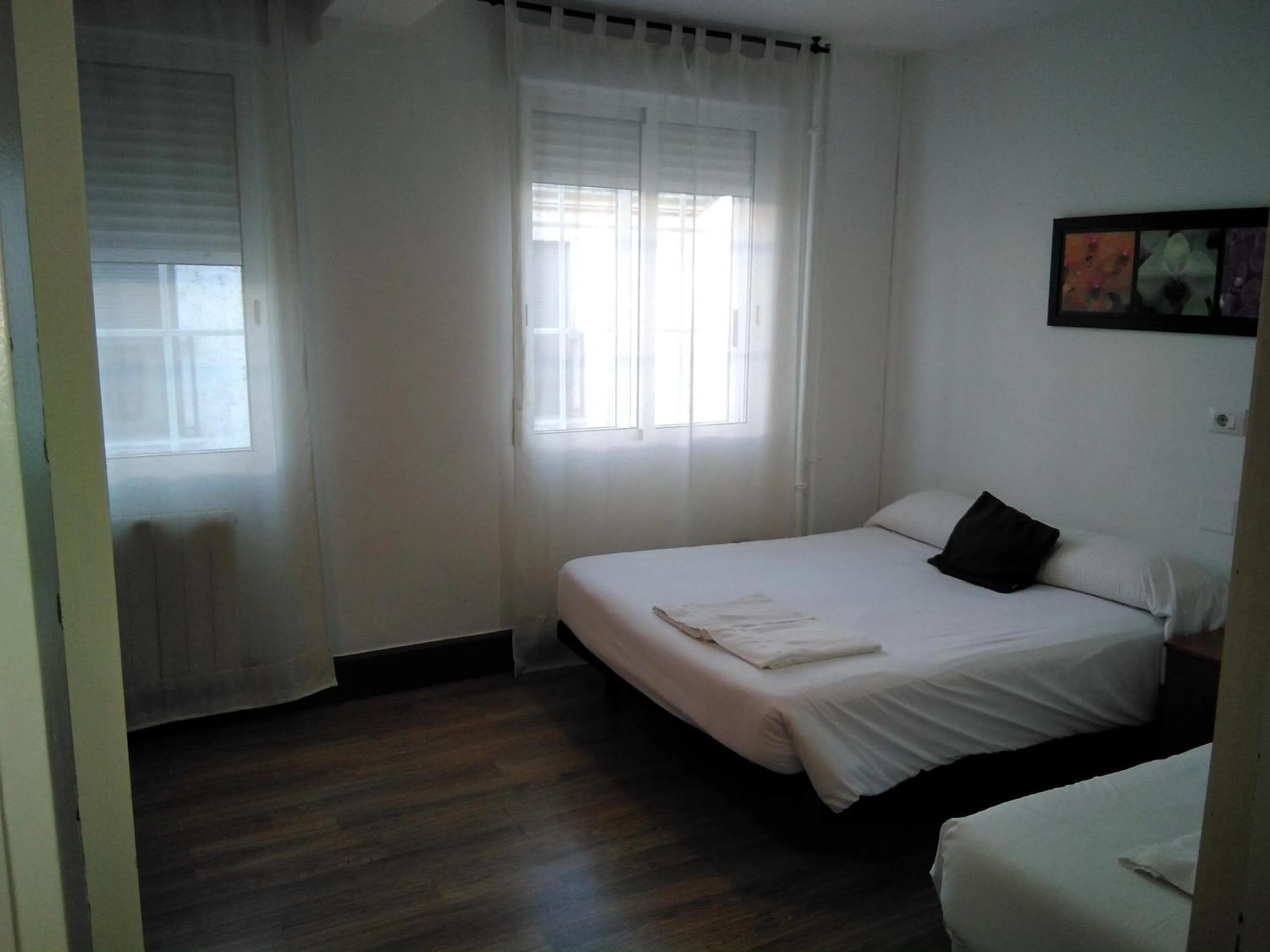 Bed in Hostal Ancla Dorada