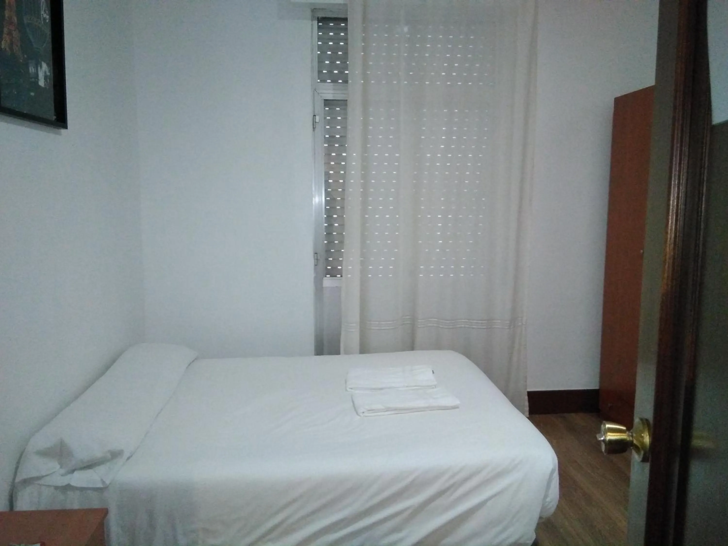 Bed in Hostal Ancla Dorada