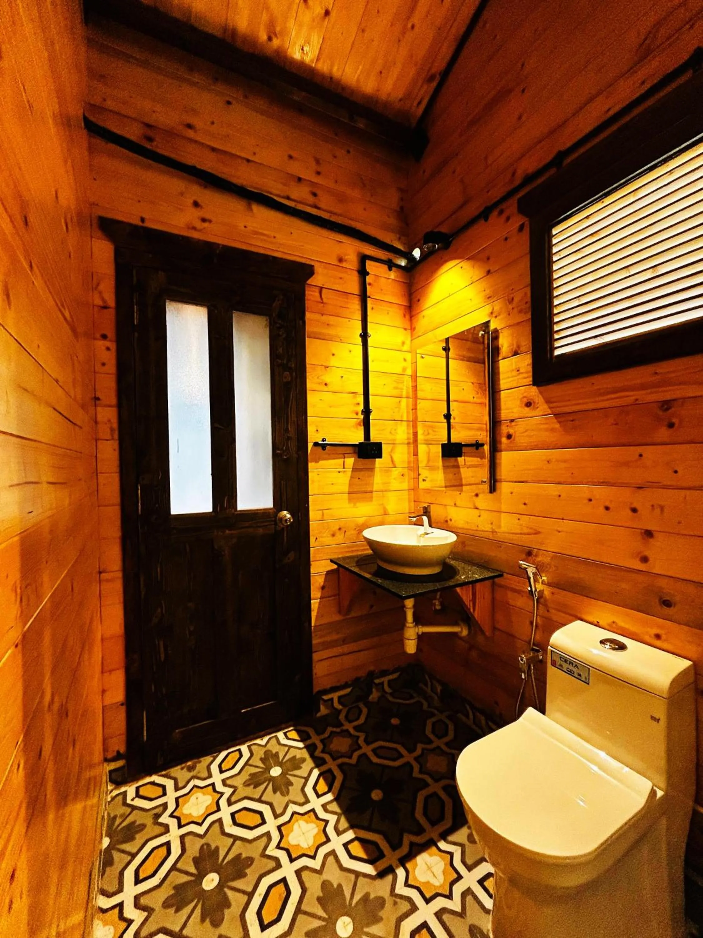 Toilet in Seclude Eco Cottages