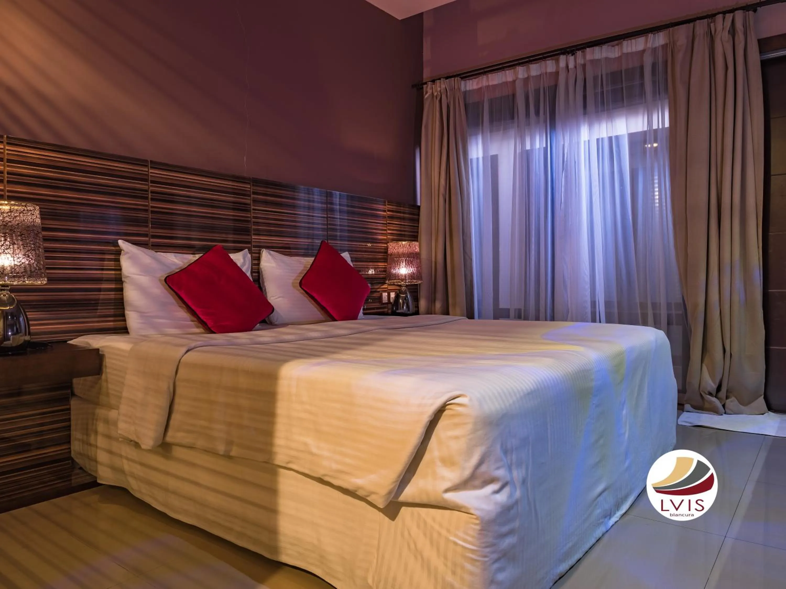 Bed in LVIS blancura Hotel