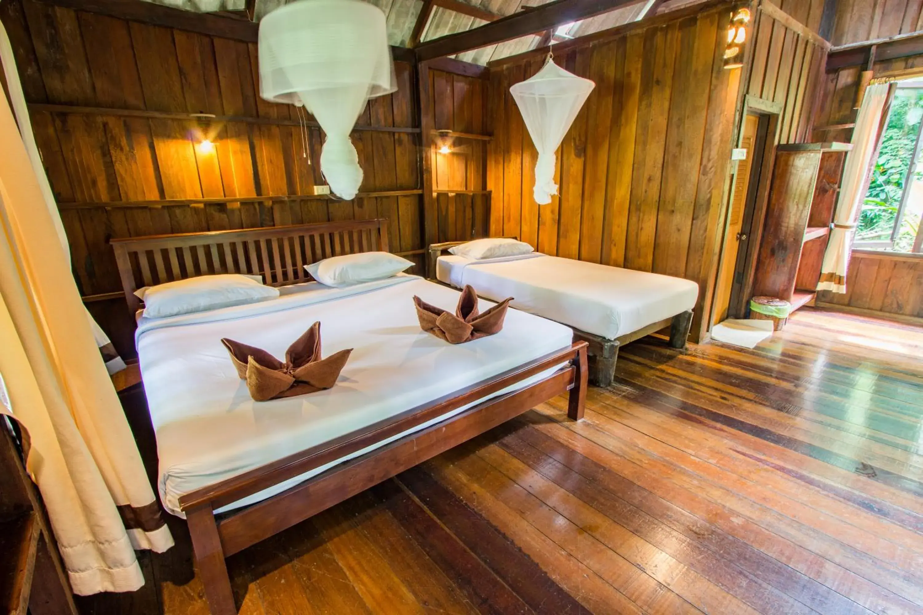 Photo of the whole room, Bed in Khao Sok Riverside Cottages Photo of the whole room, Bed in Khao Sok Riverside Cottages