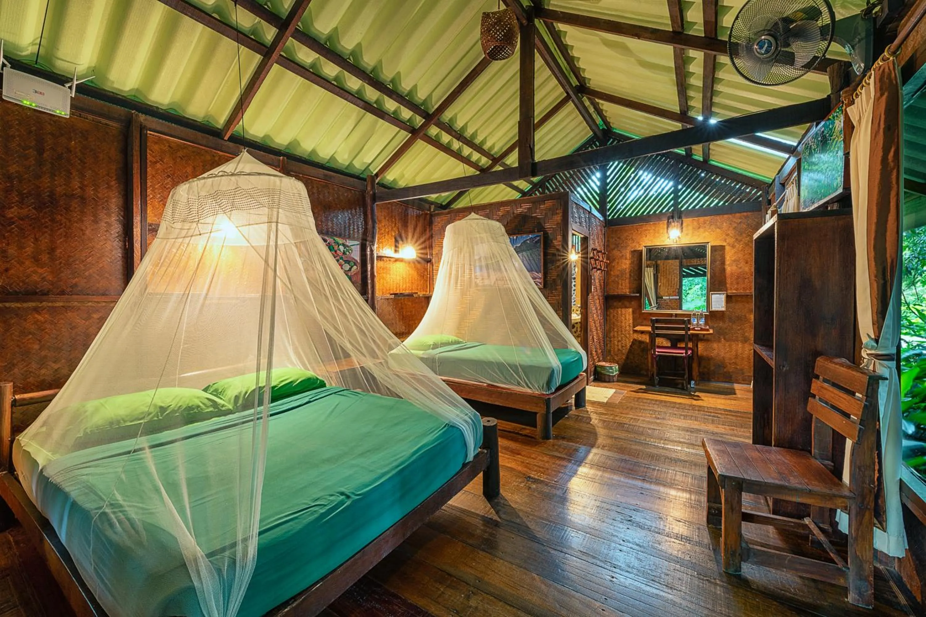 Bed in Khao Sok Riverside Cottages