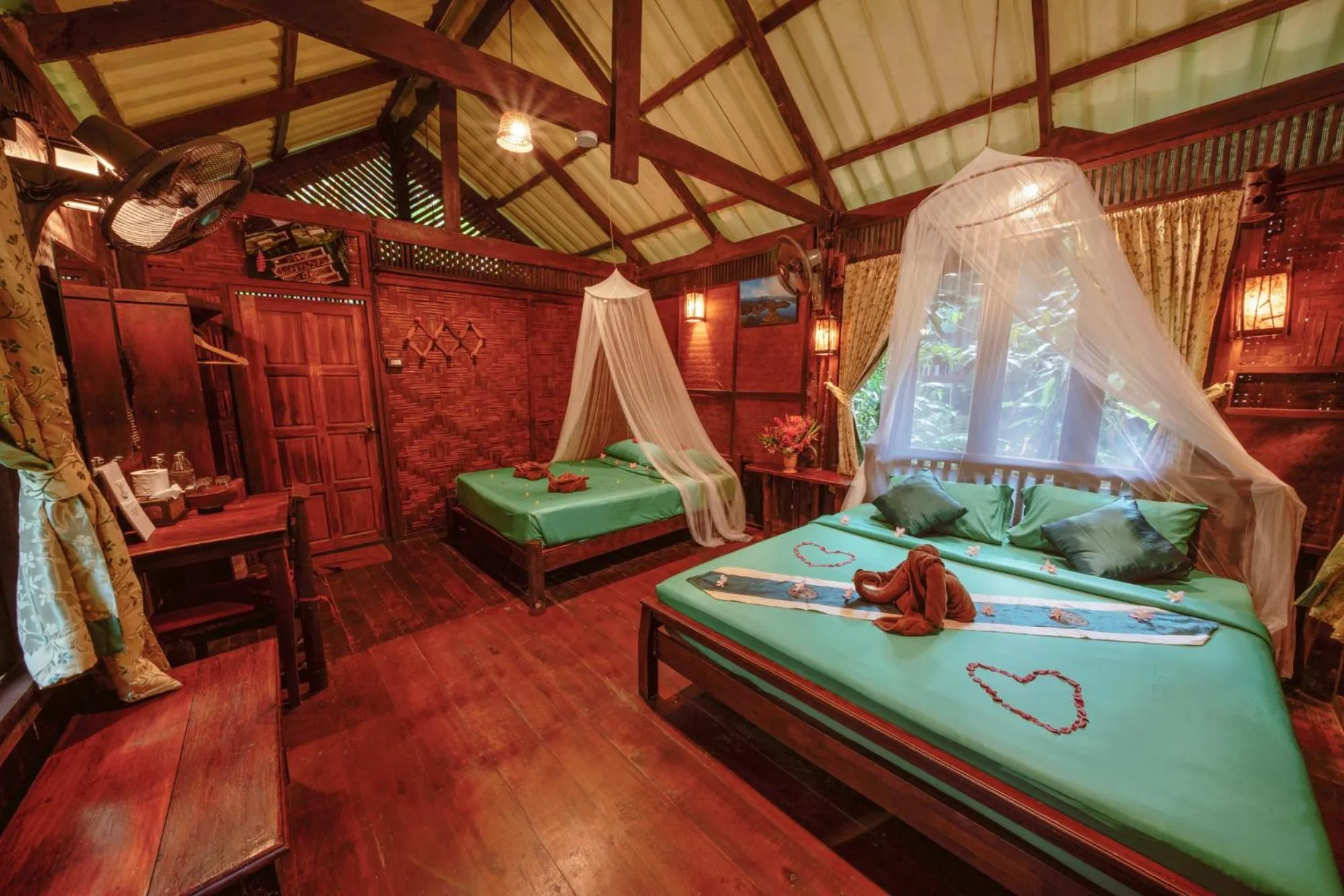 Bed in Khao Sok Riverside Cottages