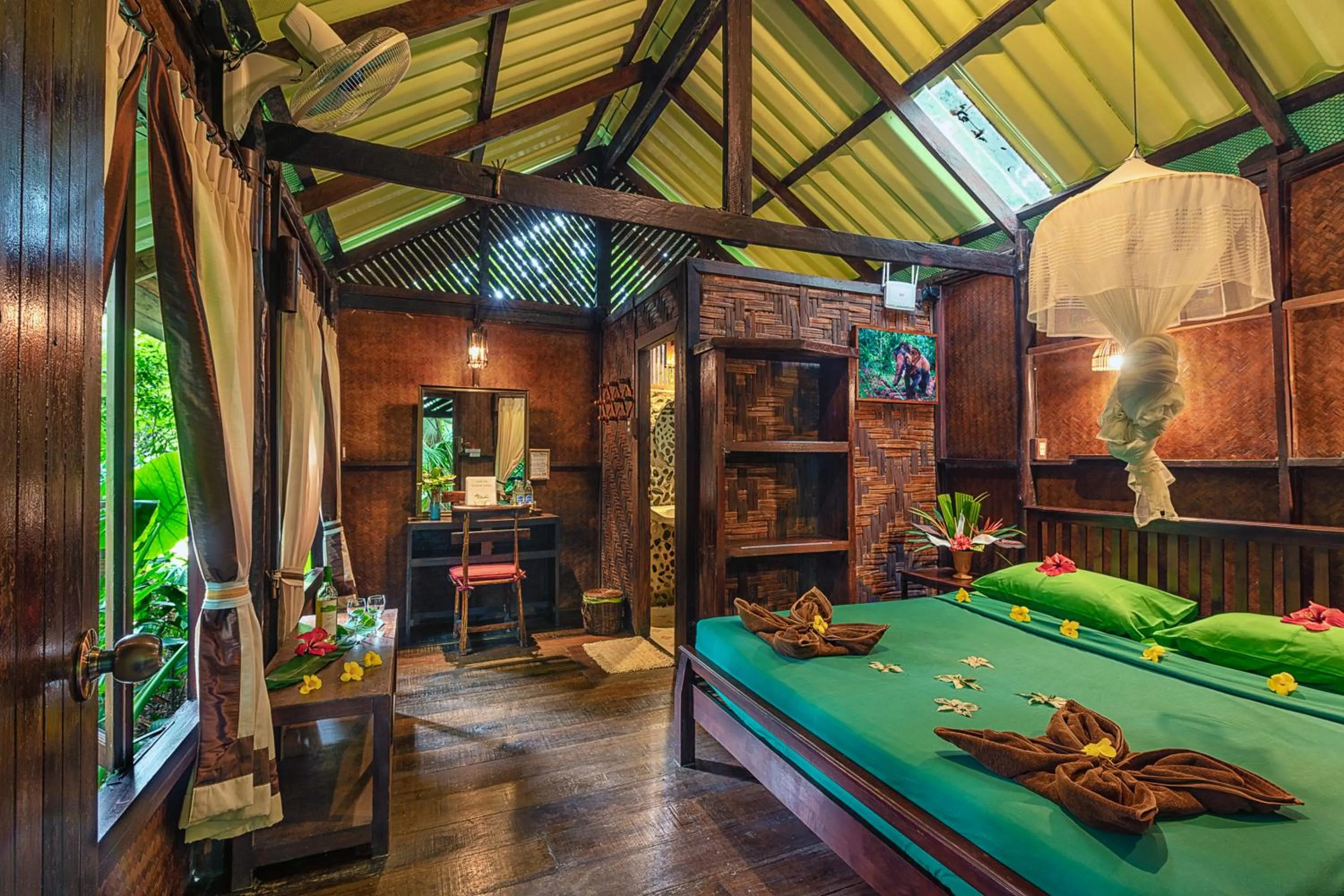 Bed in Khao Sok Riverside Cottages