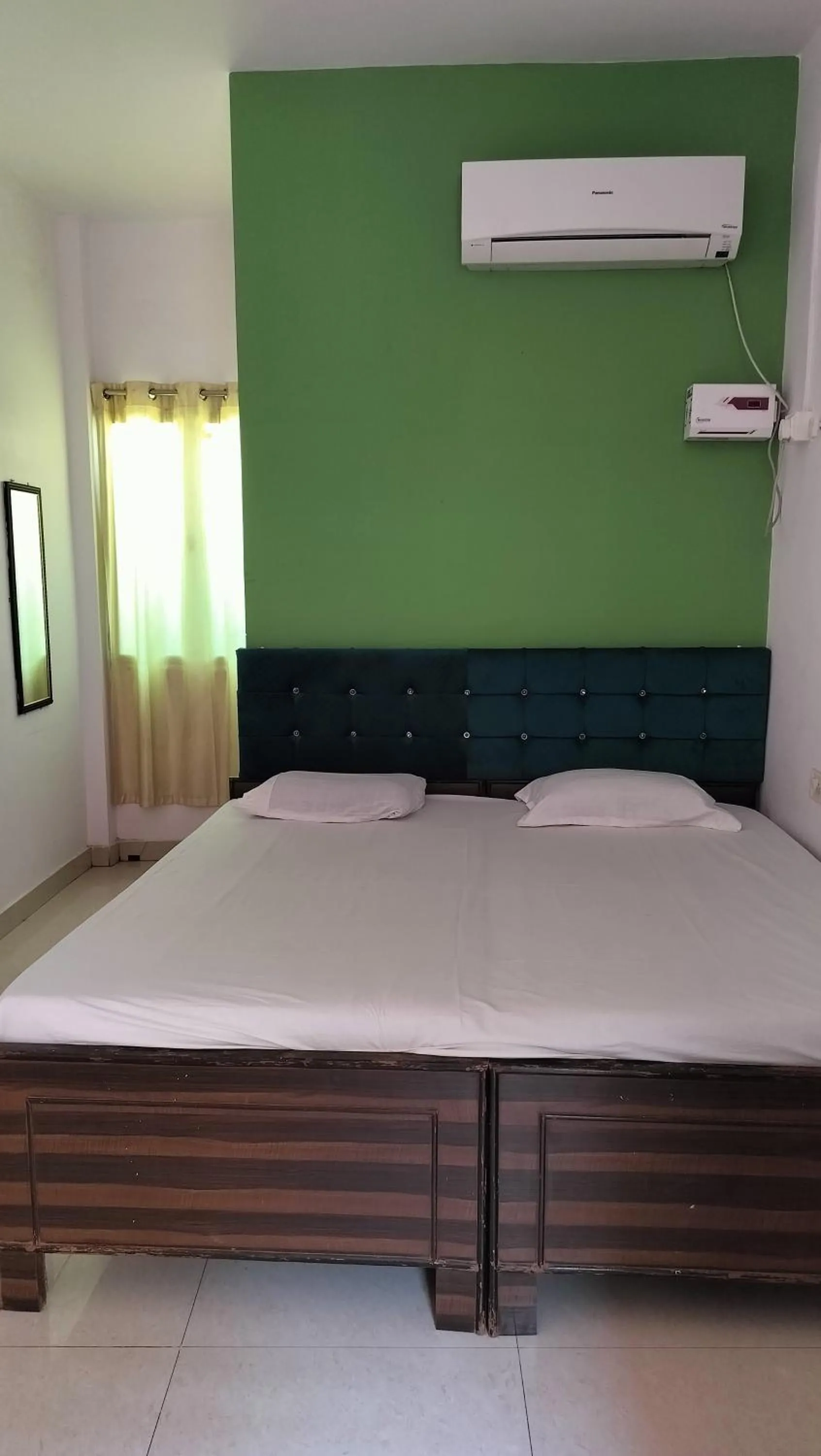 Bed in Banaras Paying Guest House