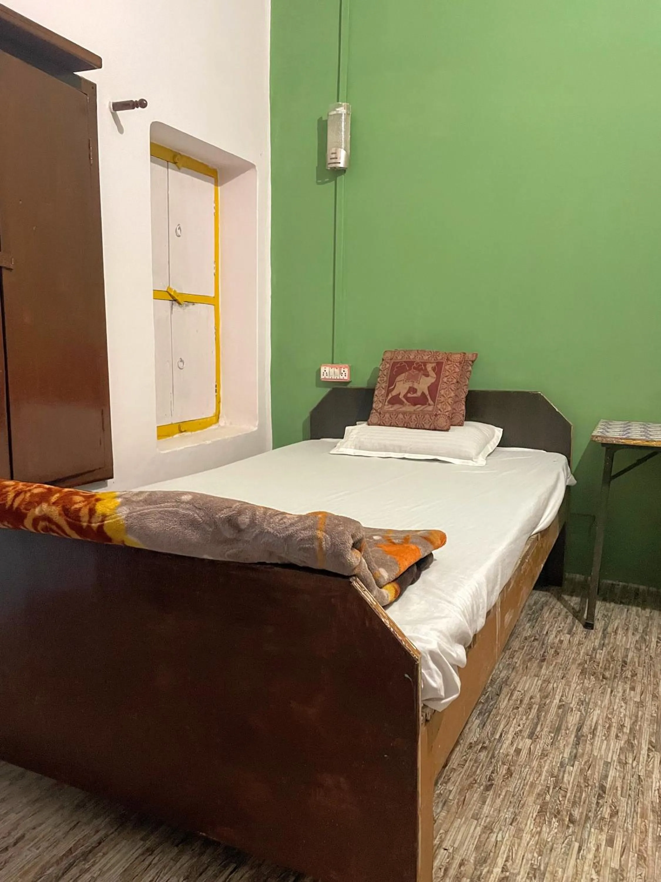 Bed in Banaras Paying Guest House