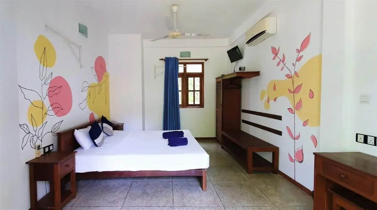 Bedroom, Bed in Blue Turtle Hotel Bedroom, Bed in Blue Turtle Hotel