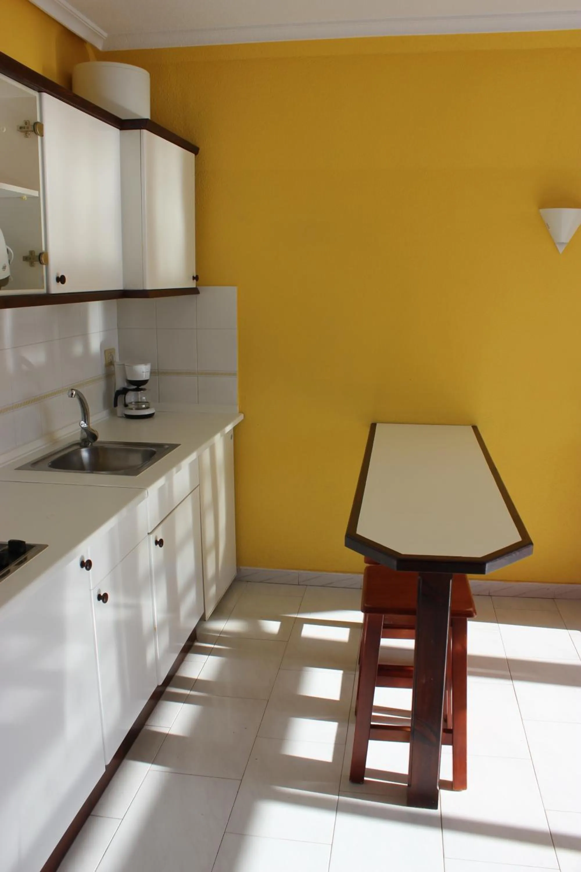 Kitchen or kitchenette in Aparthotel la Piramide