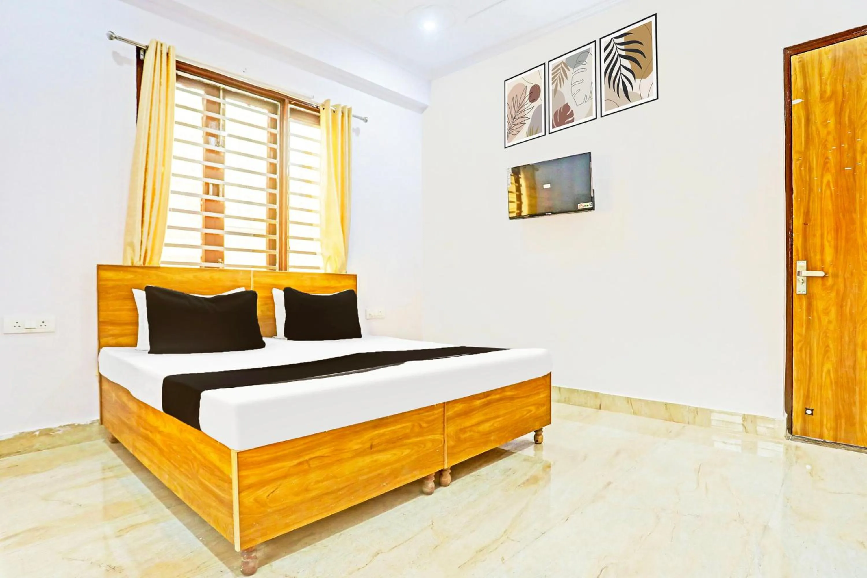 Bedroom in Hotel O High Sky Residency