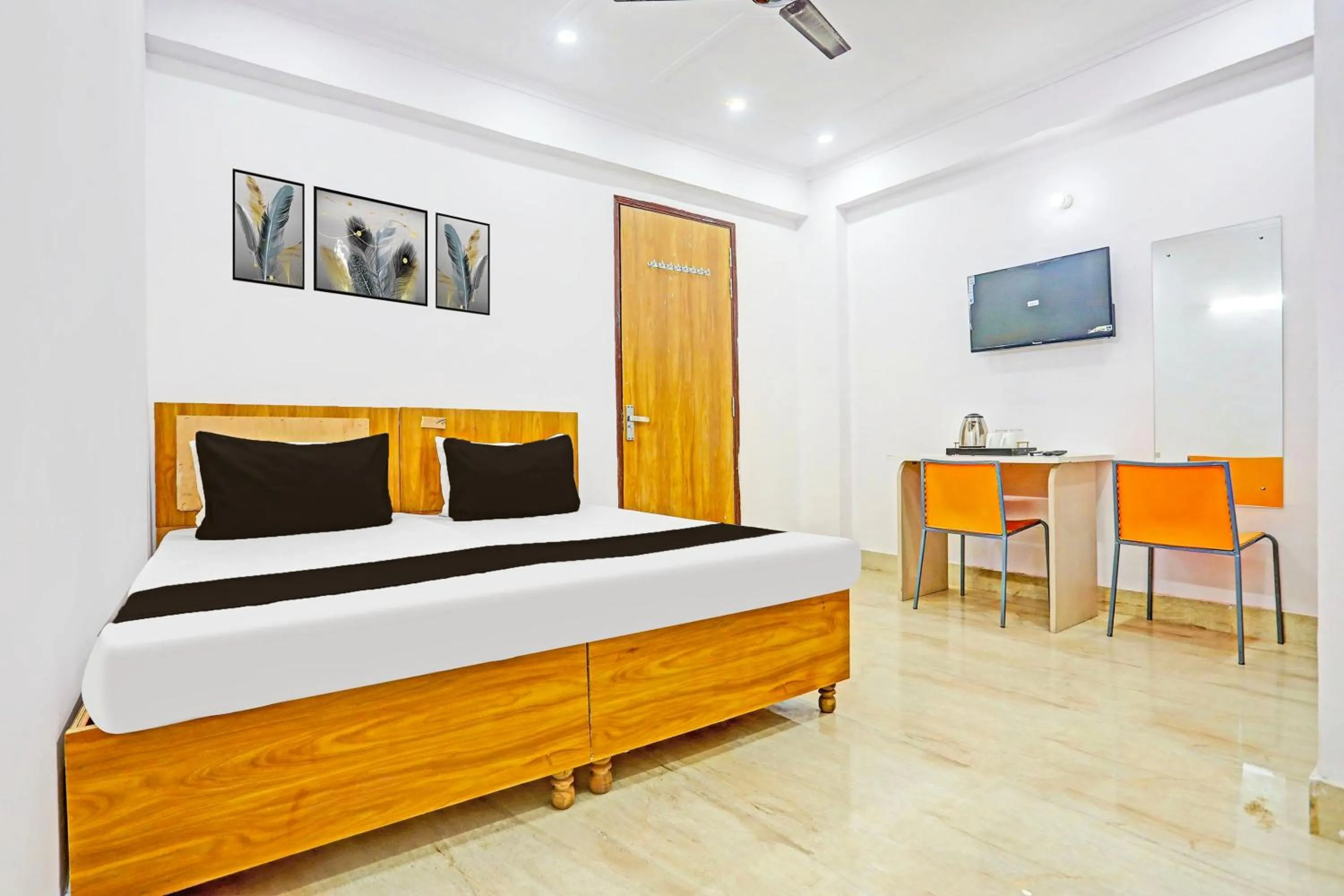 Bedroom in Hotel O High Sky Residency