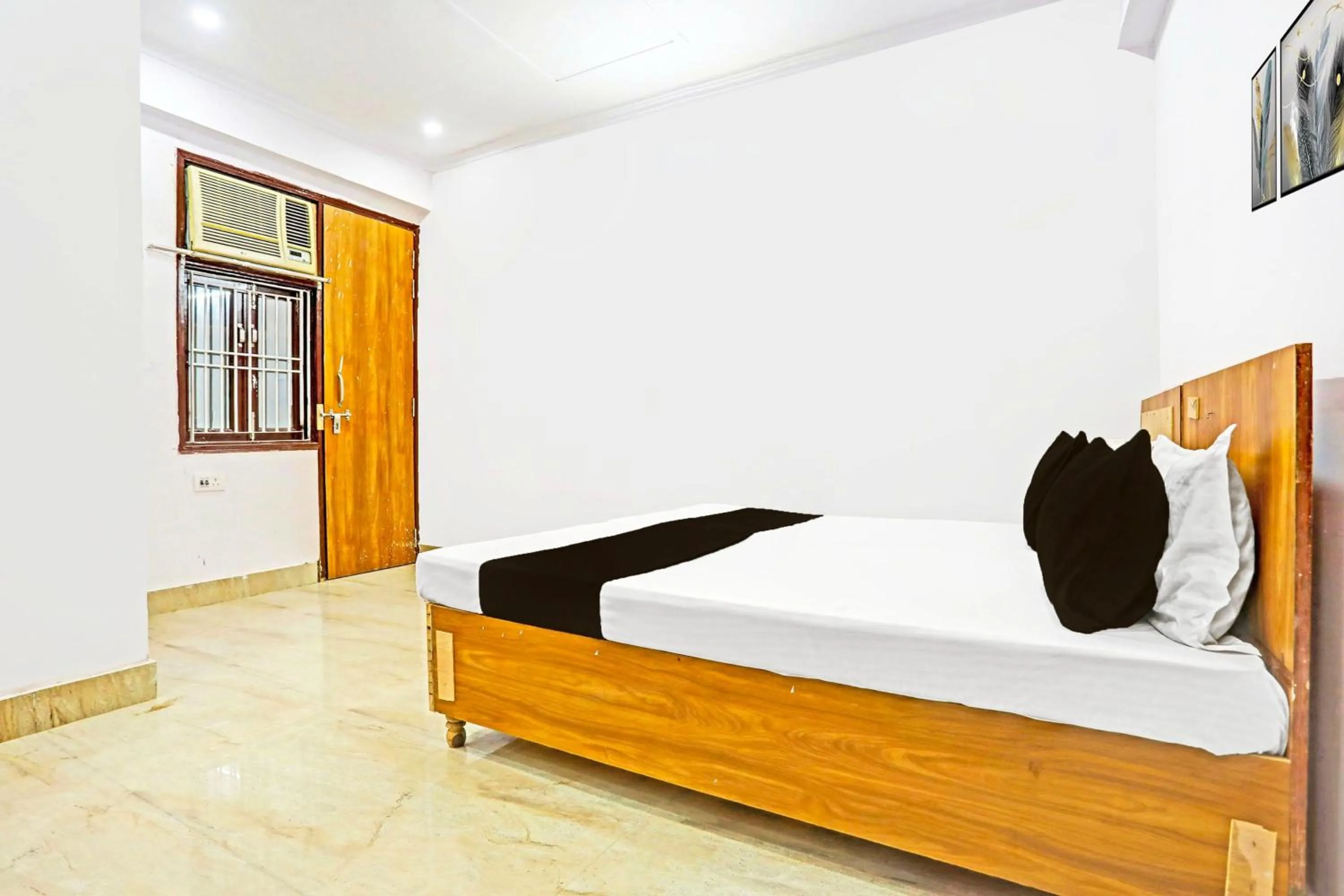 Bedroom in Hotel O High Sky Residency