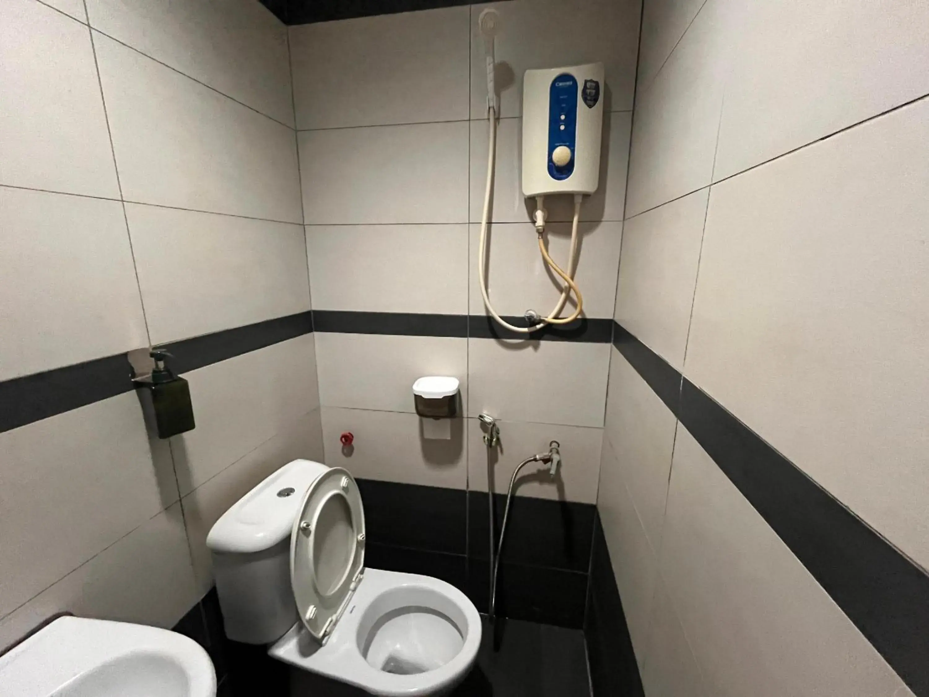 Bathroom in Hotel O Jb Sojourn Bathroom in Hotel O Jb Sojourn