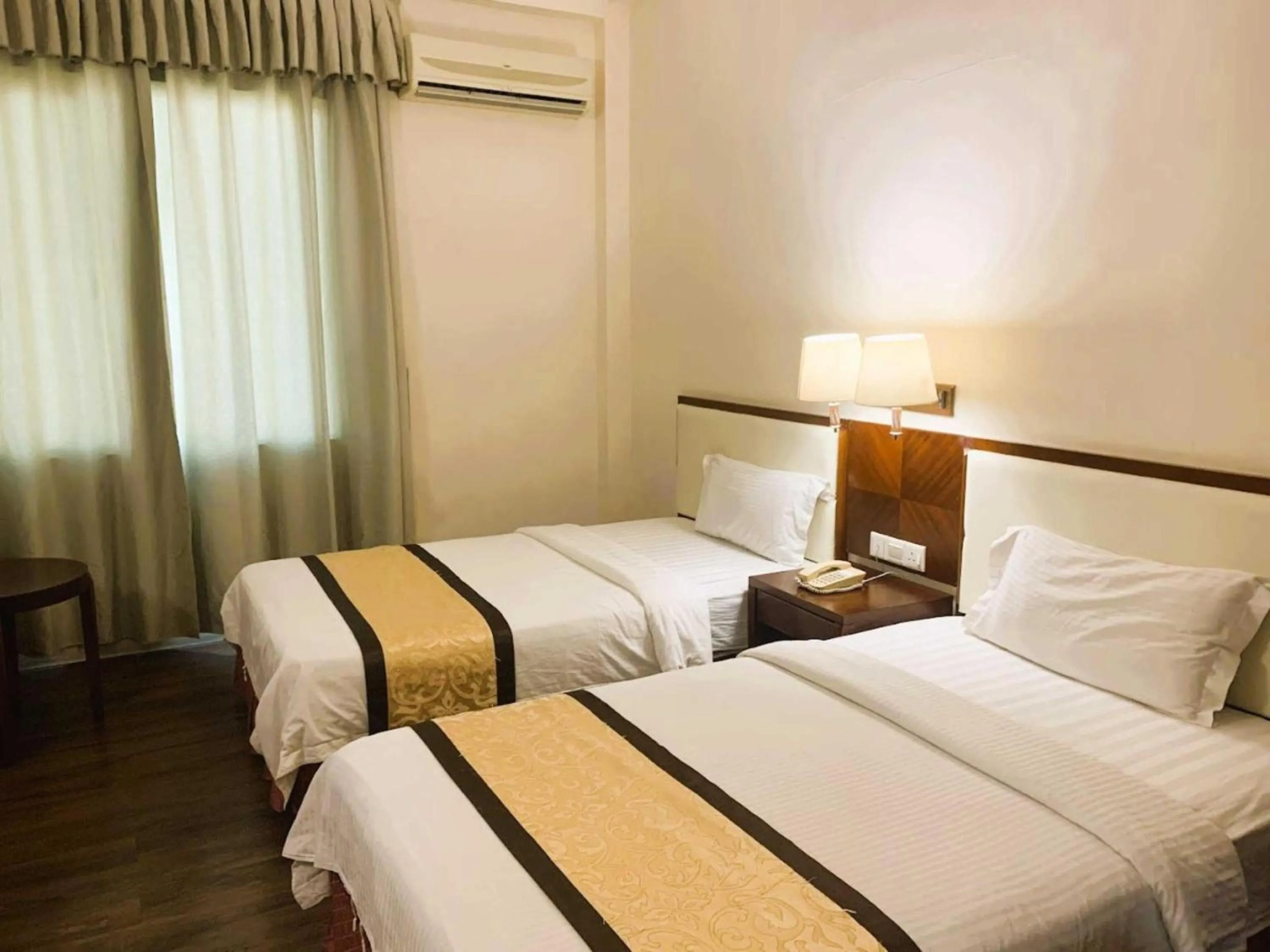 Bedroom in Hotel O Atari Inn