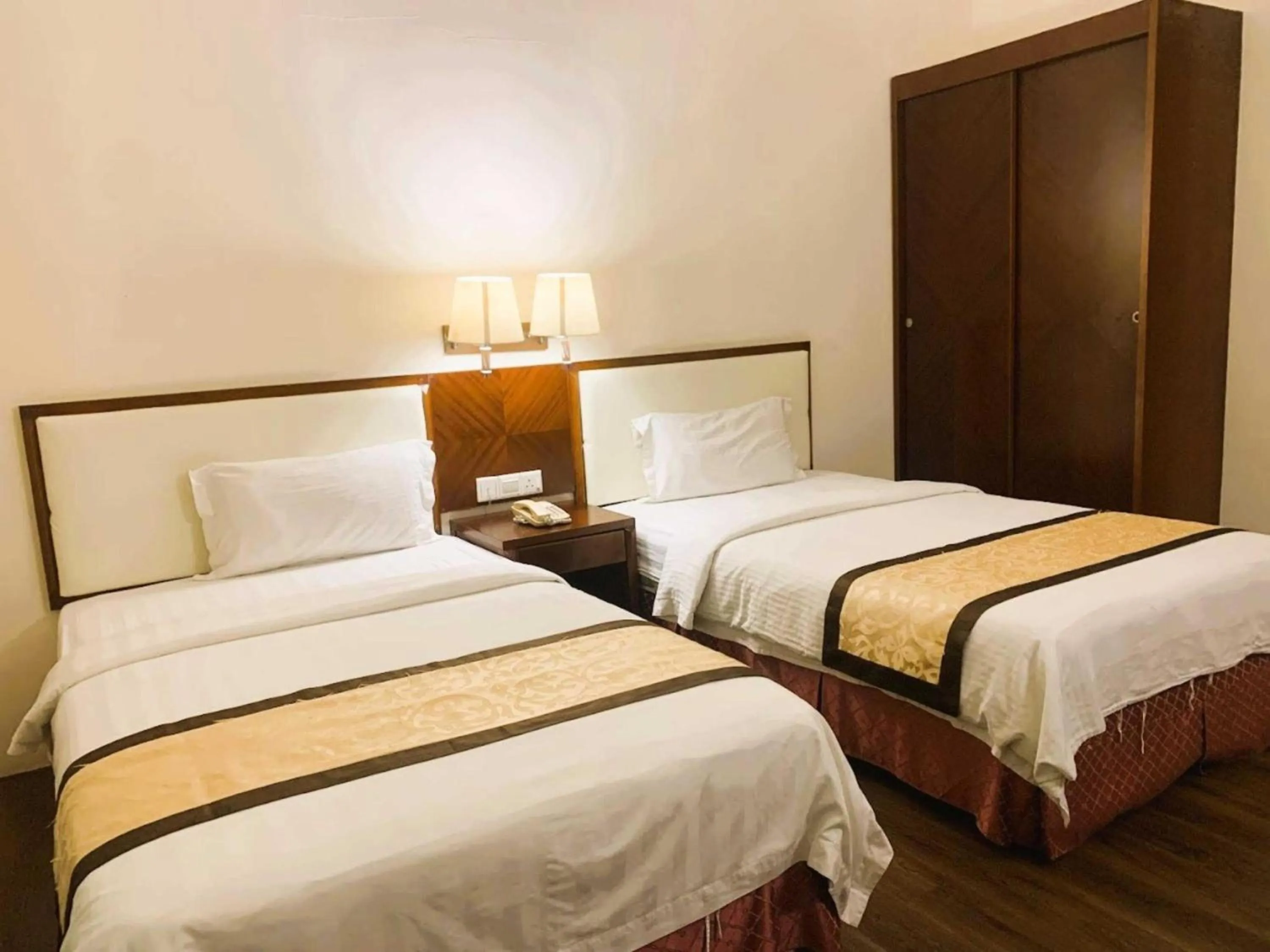 Bedroom in Hotel O Atari Inn