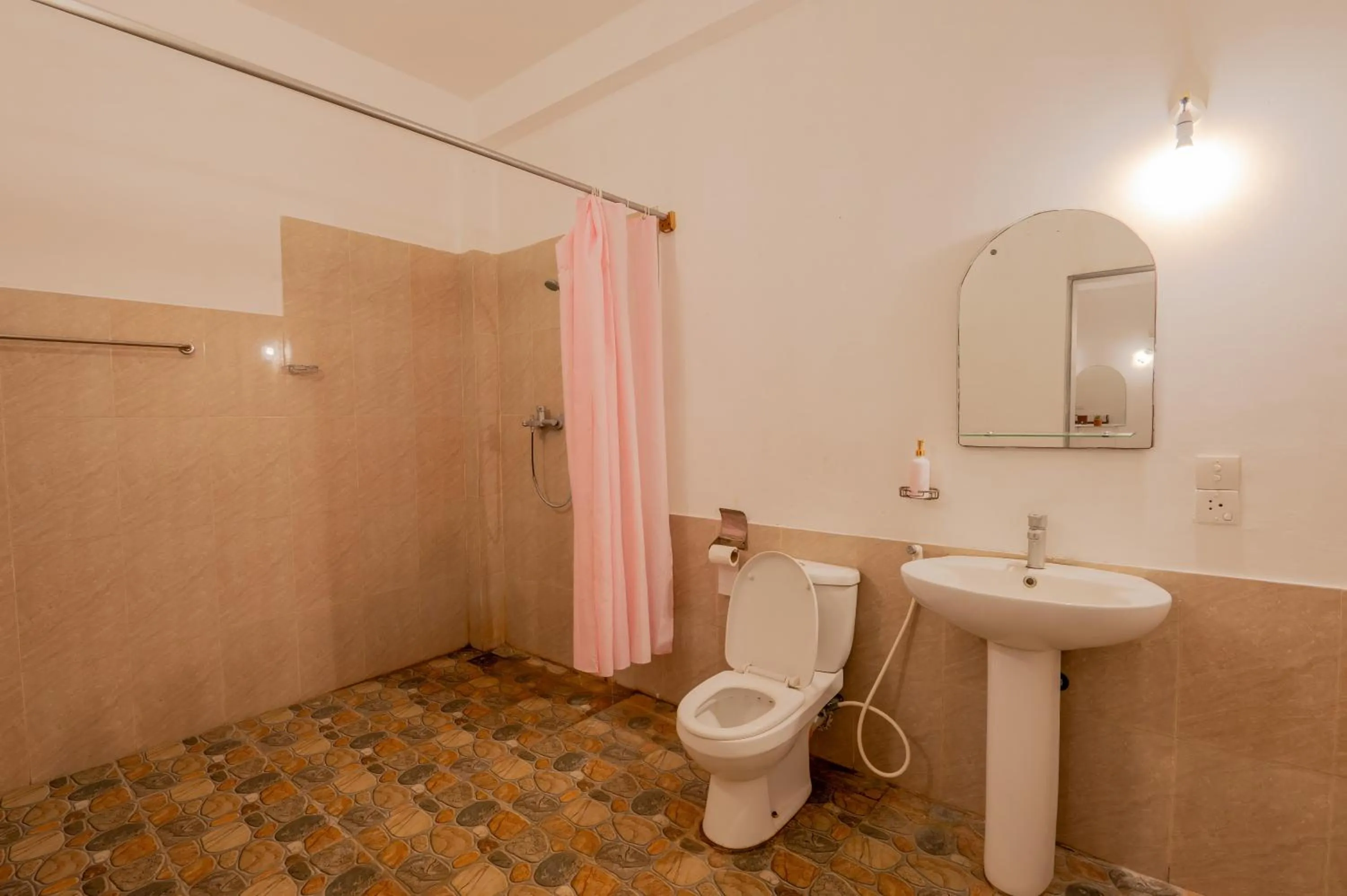 Toilet in Ayurvedic Lanka Wellness Hotel