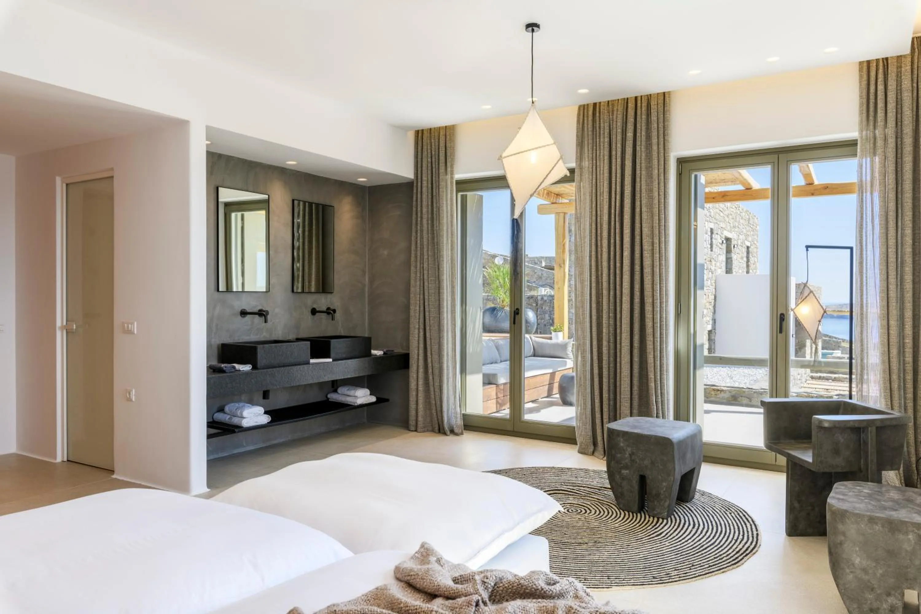 Bed in Nasta Suites & Villas Intentional Living Mykonos