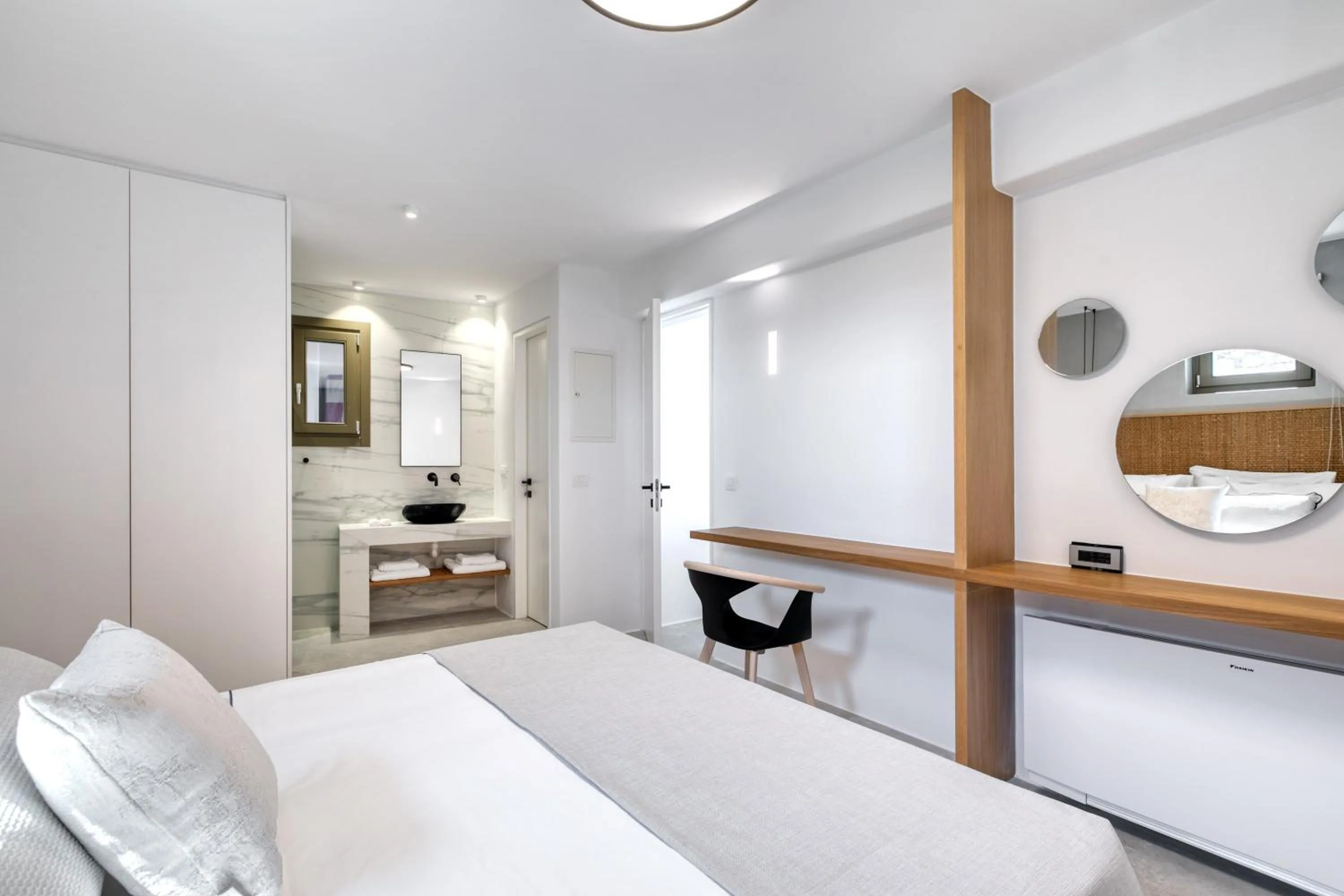 Bed in Nasta Suites & Villas Intentional Living Mykonos