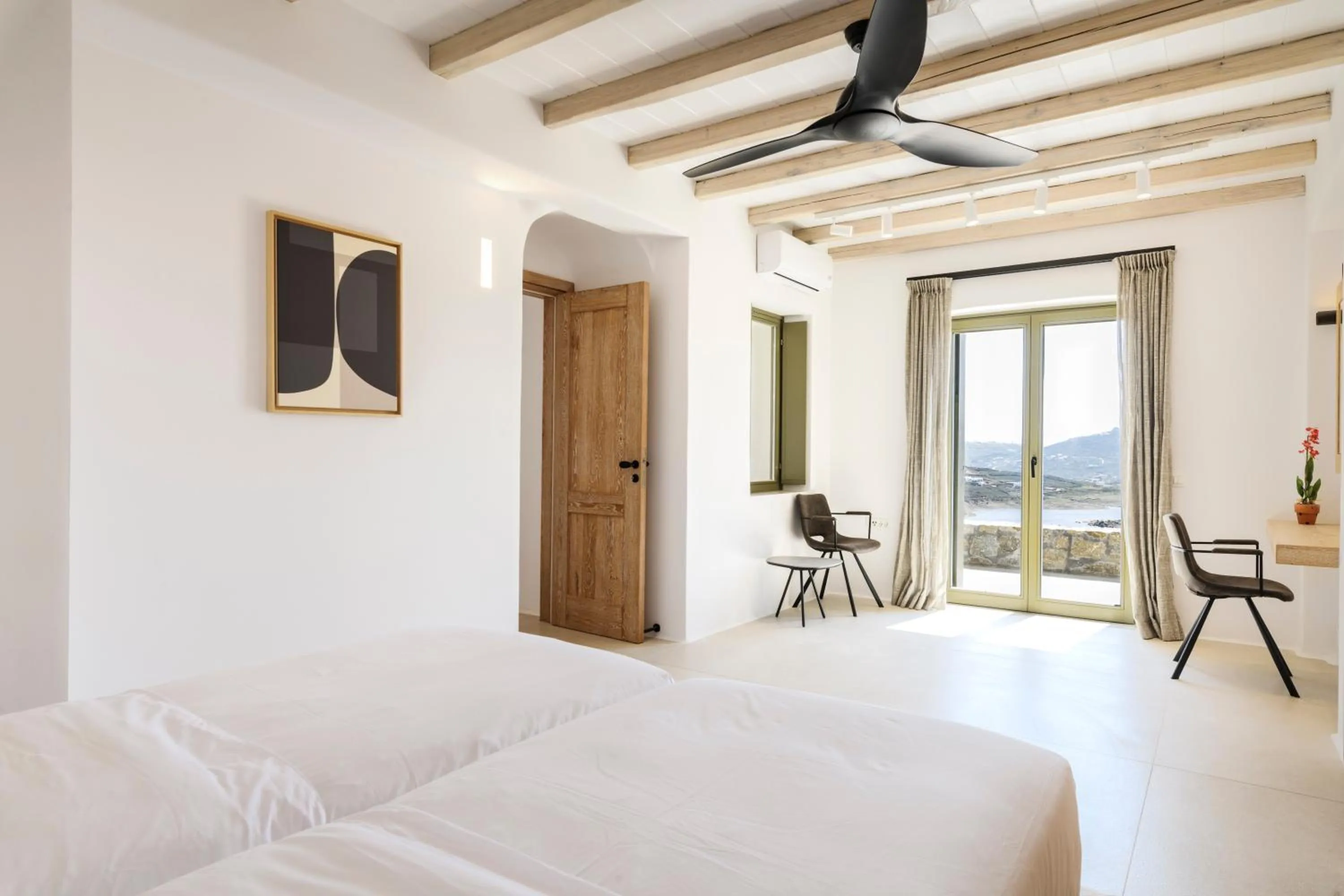 Bed in Nasta Suites & Villas Intentional Living Mykonos