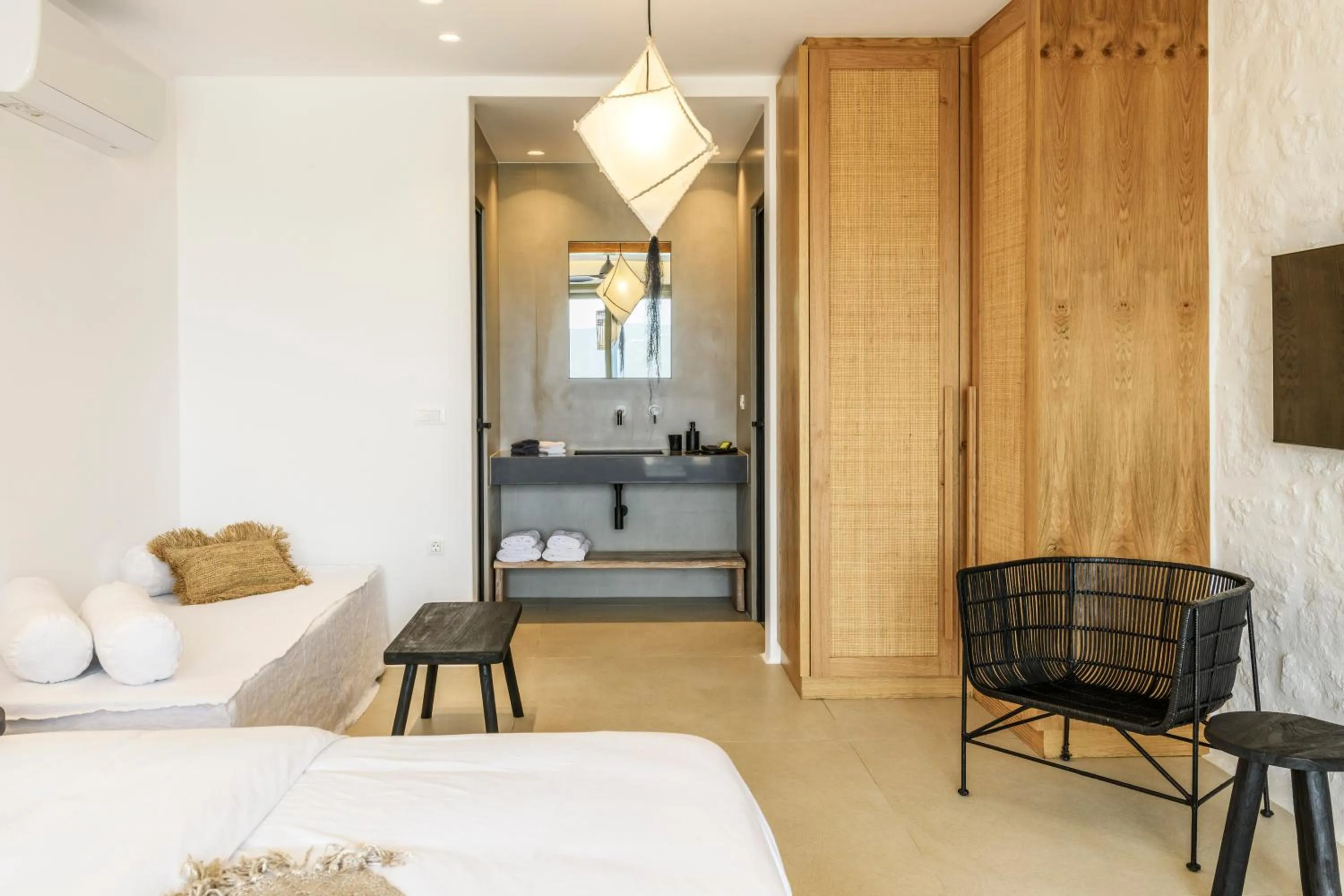 Bed in Nasta Suites & Villas Intentional Living Mykonos