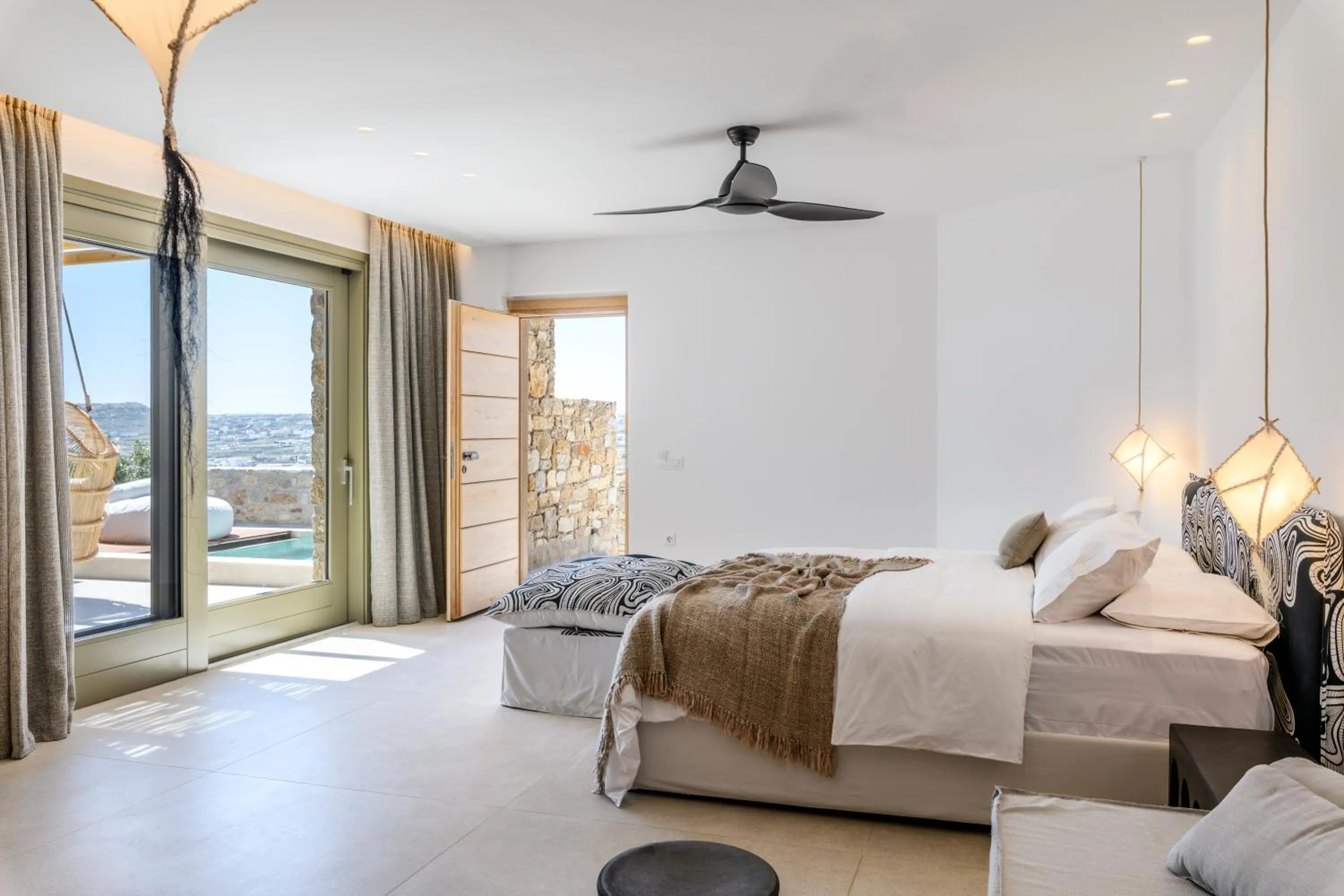 Bed in Nasta Suites & Villas Intentional Living Mykonos