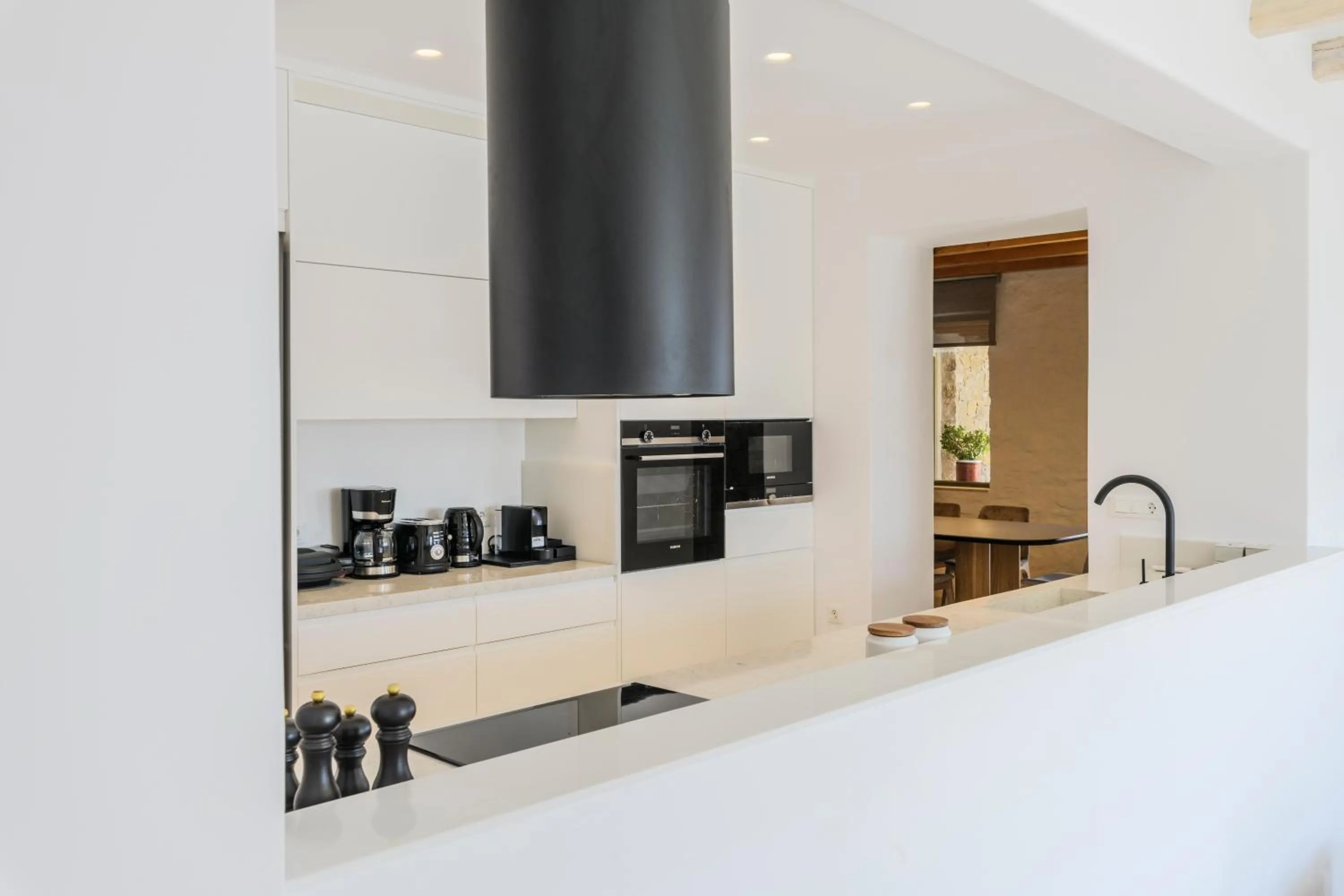 Kitchen or kitchenette in Nasta Suites & Villas Intentional Living Mykonos