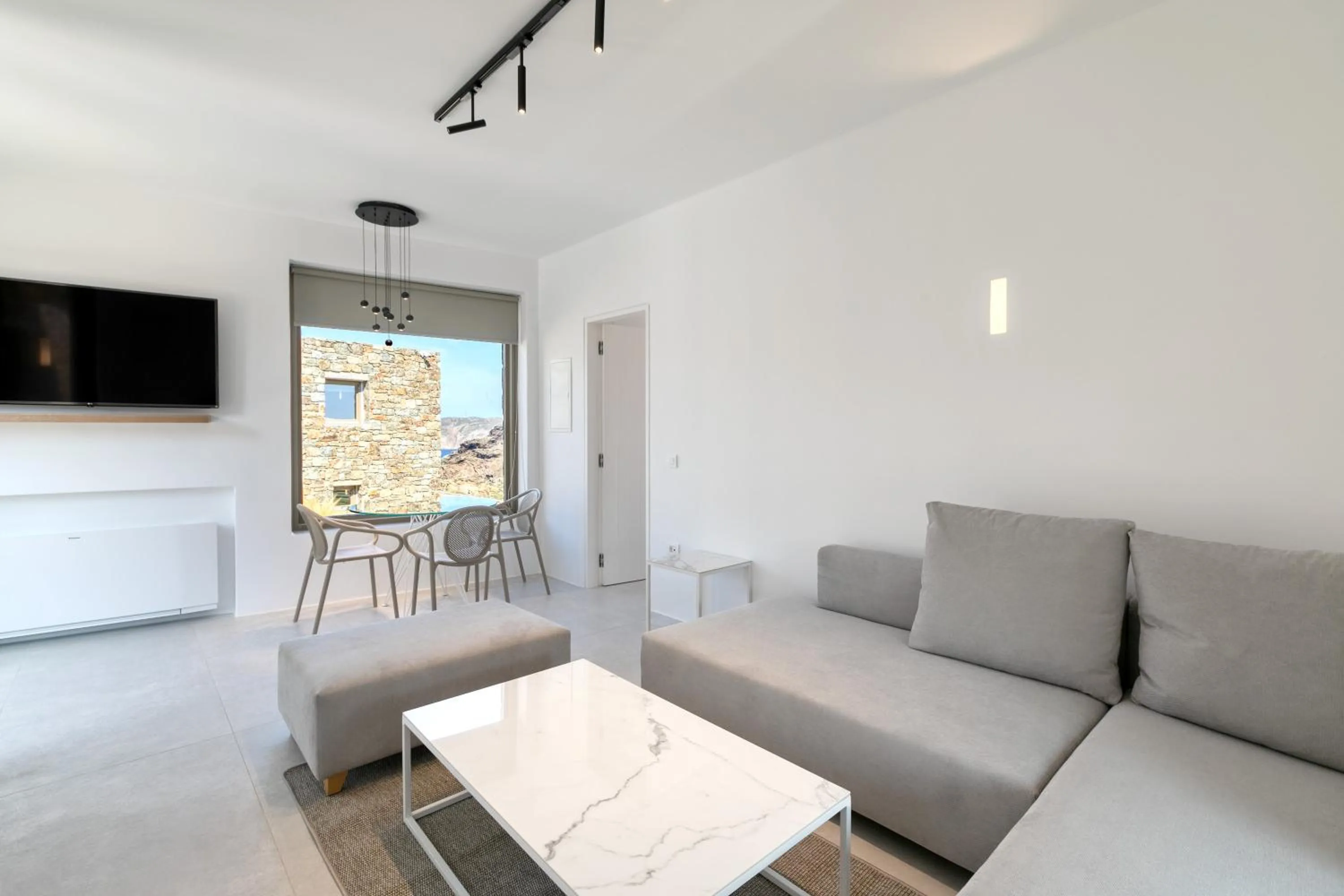 TV and multimedia in Nasta Suites & Villas Intentional Living Mykonos