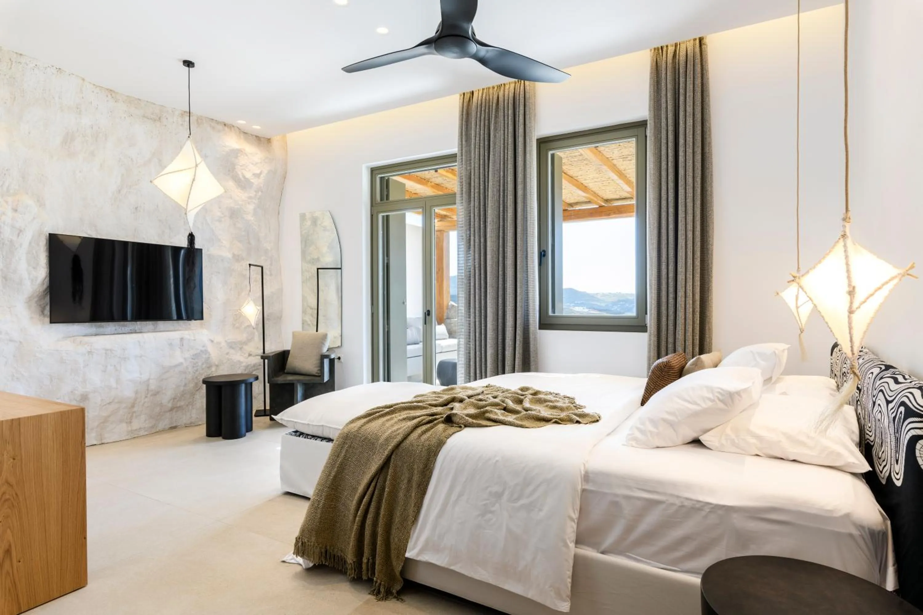 Bed in Nasta Suites & Villas Intentional Living Mykonos
