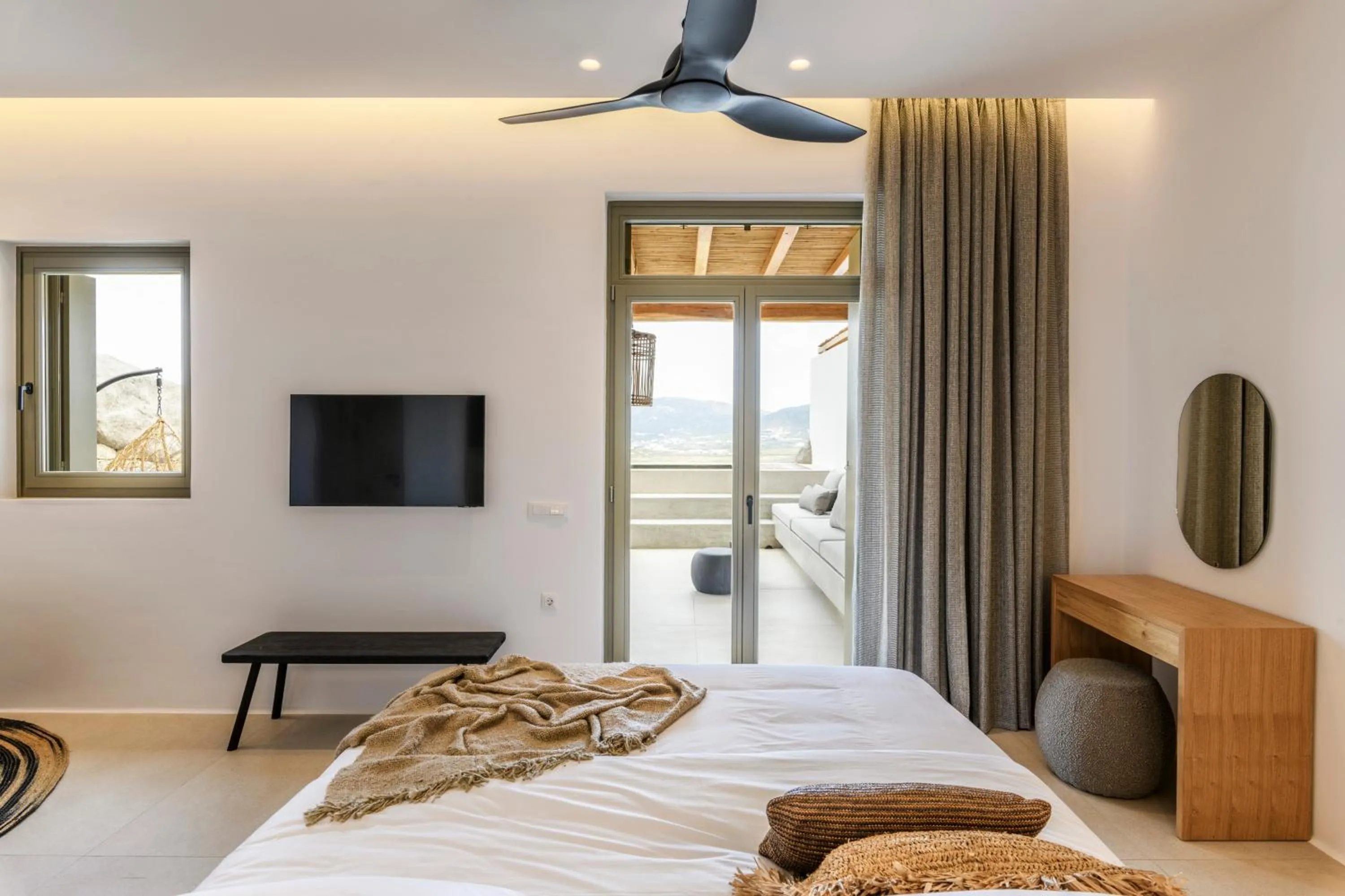 Bed in Nasta Suites & Villas Intentional Living Mykonos
