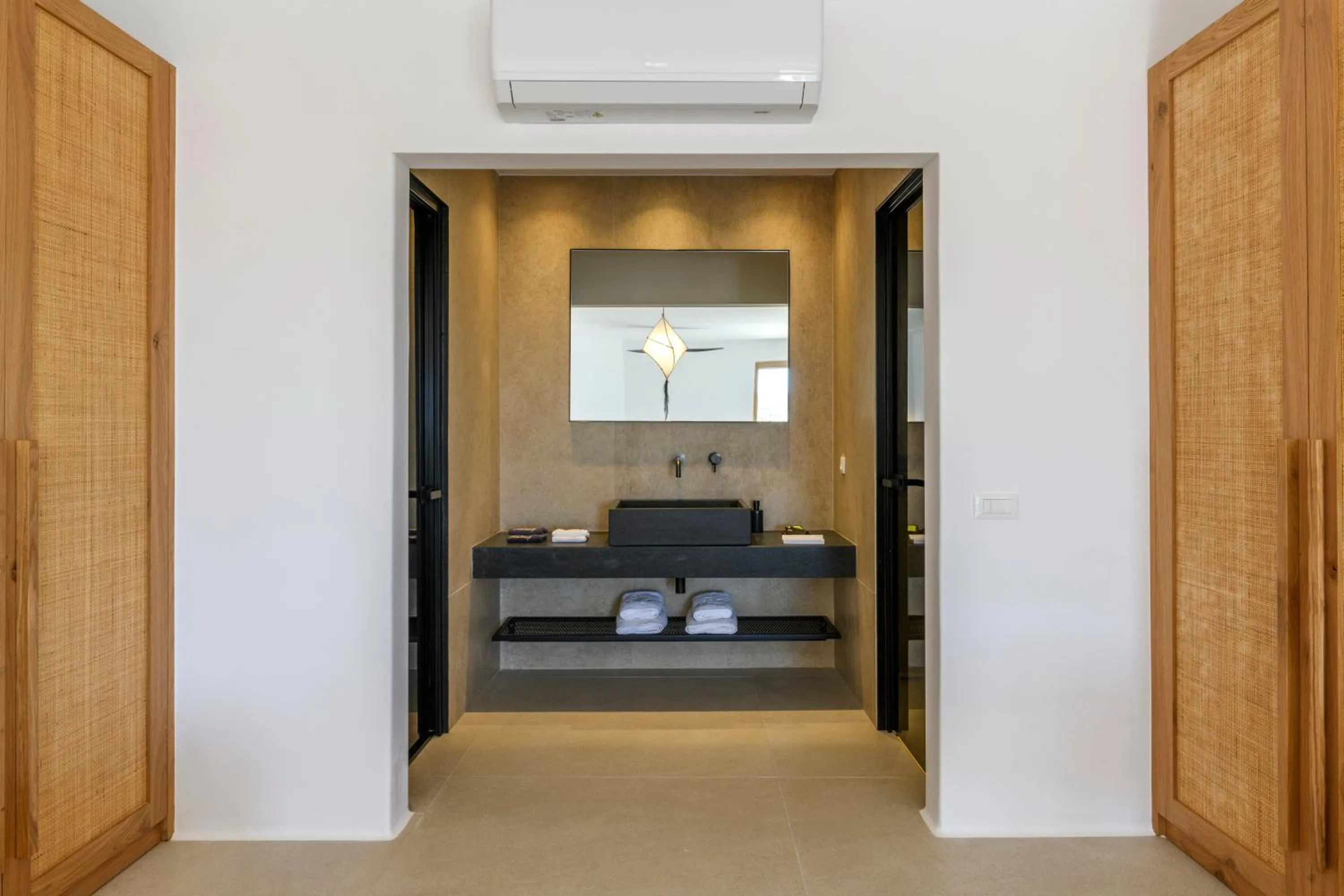 towels, Bed in Nasta Suites & Villas Intentional Living Mykonos