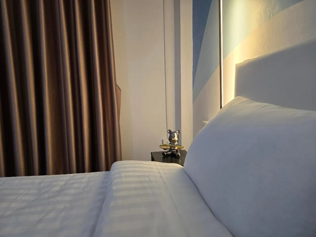 Bed in SRINN Hotel Pattaya Klang