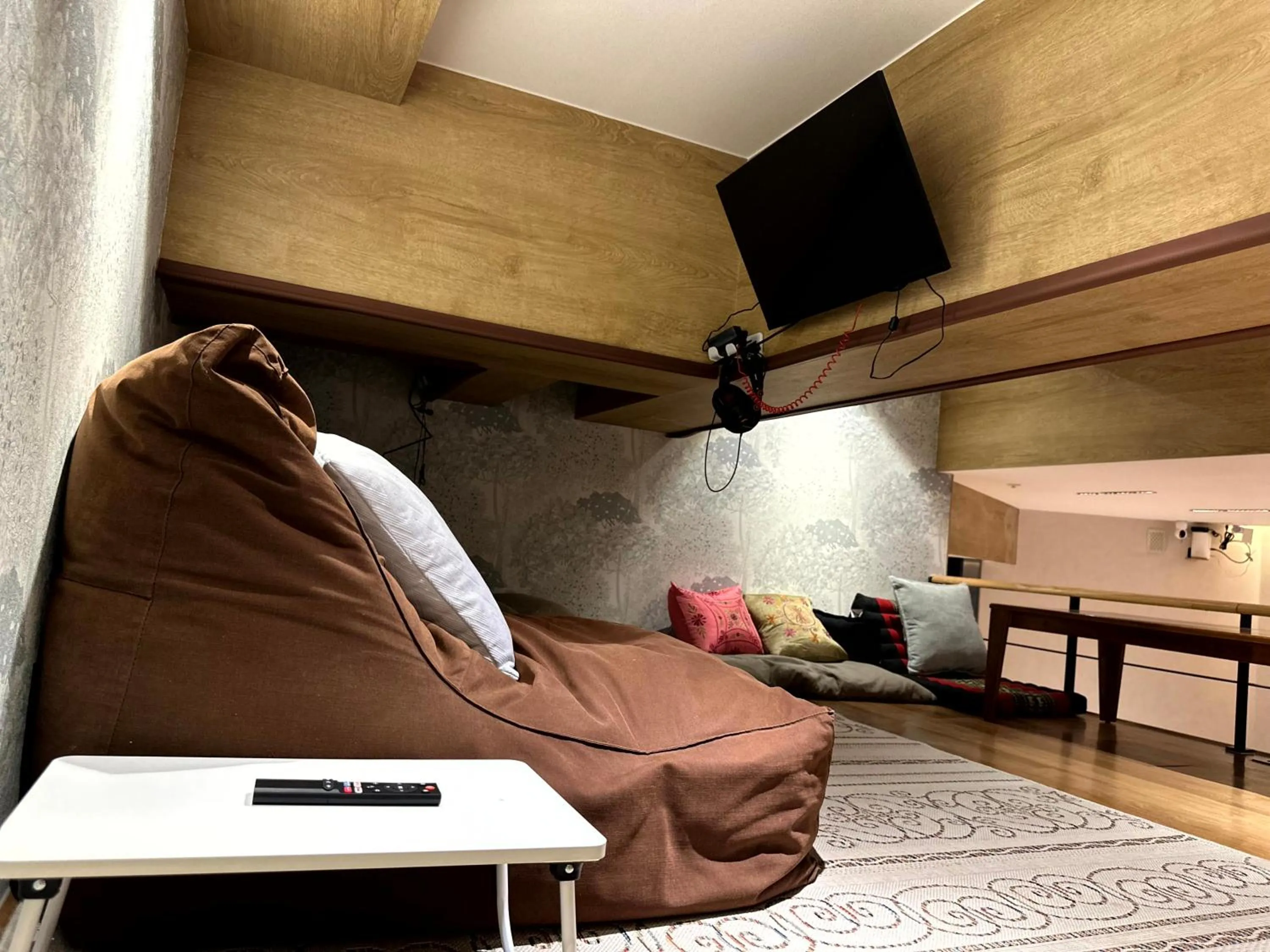 Communal lounge/ TV room in Nomad Live Hostel