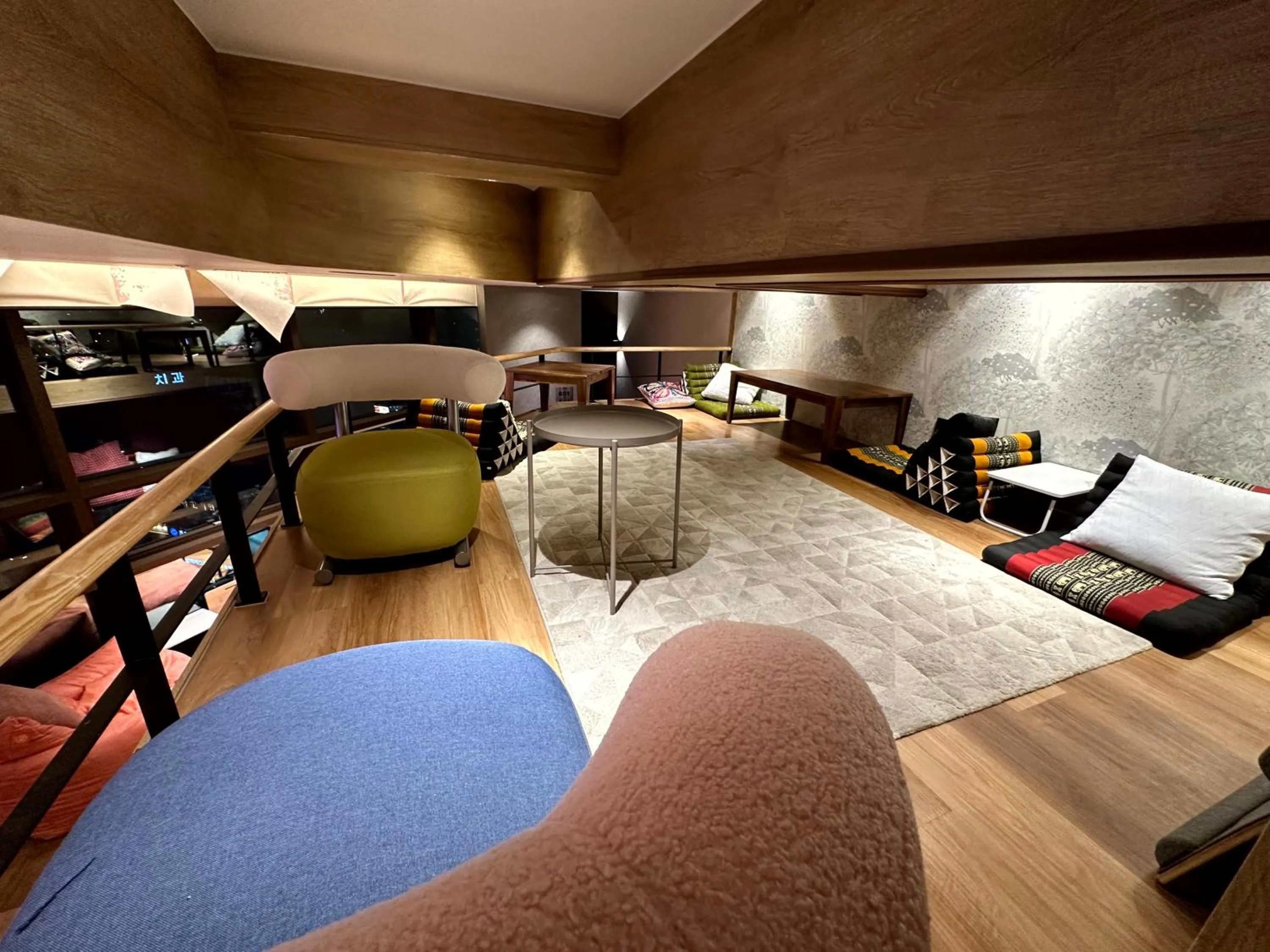 Communal lounge/ TV room in Nomad Live Hostel