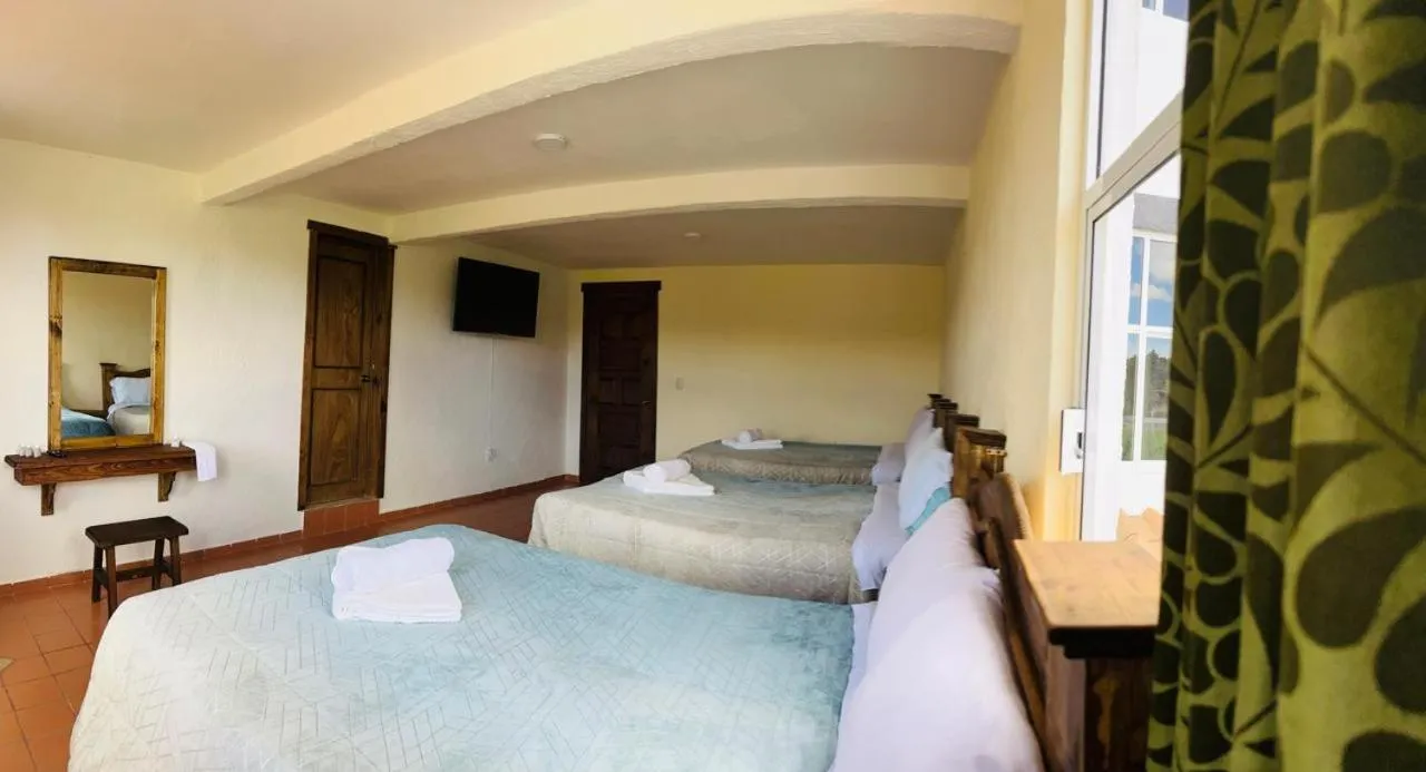 Photo of the whole room, Bed in Hotel Renacer