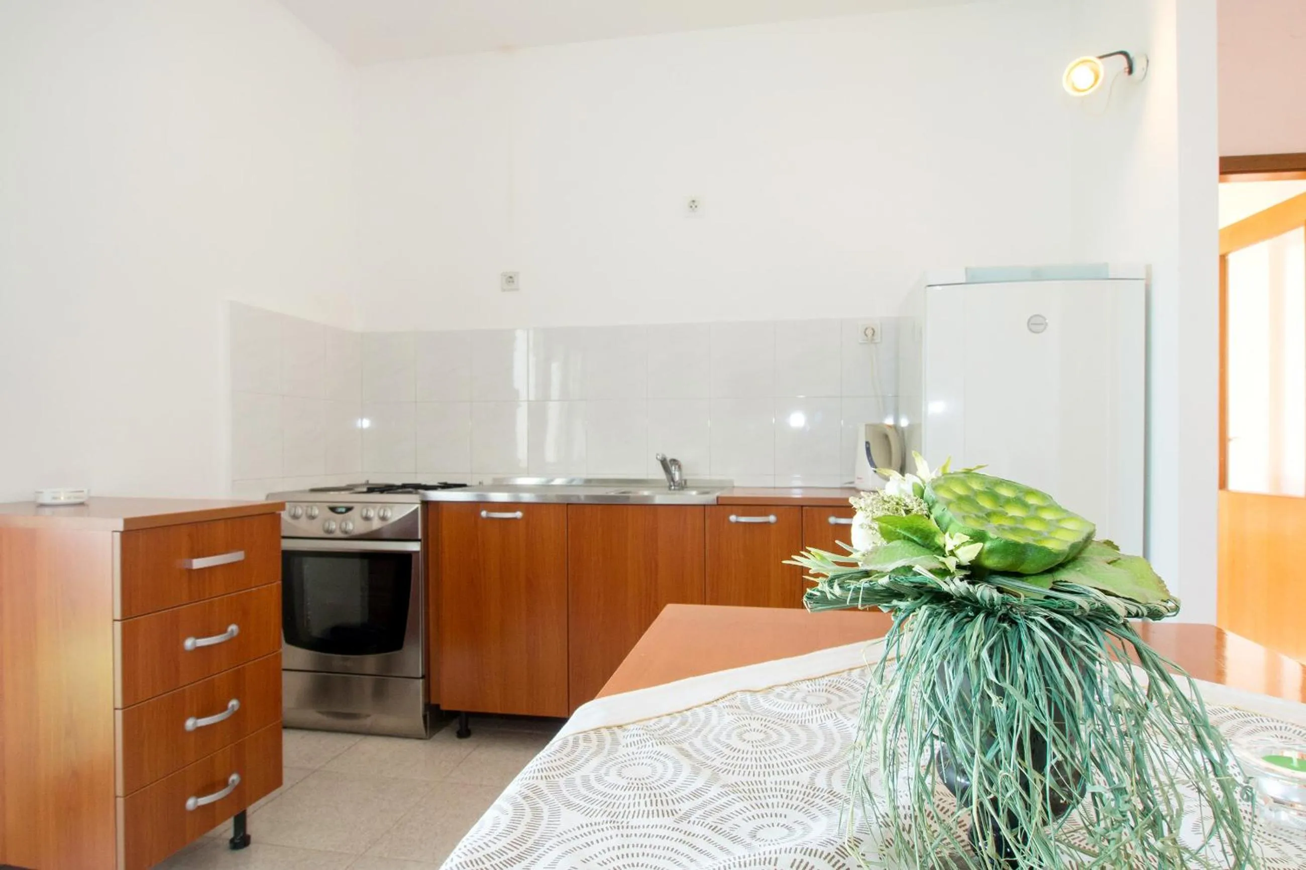 Kitchen or kitchenette in Beach Guesthouse Mediteran