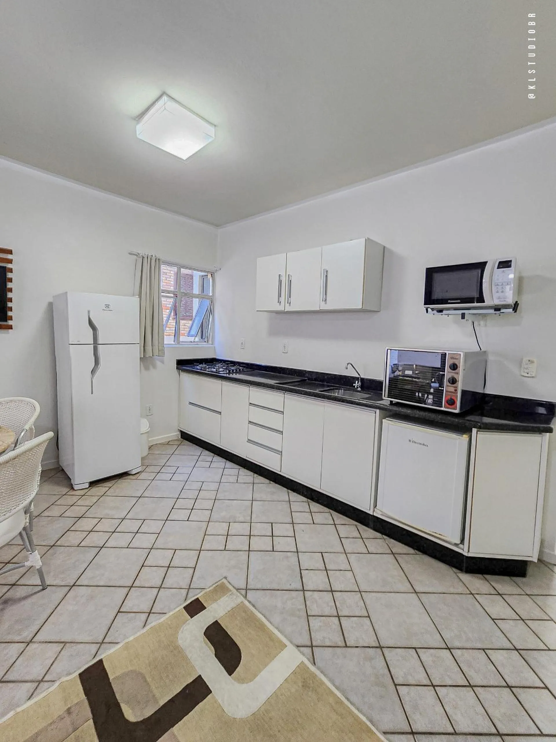 Communal kitchen in Quattro Isole Residencial