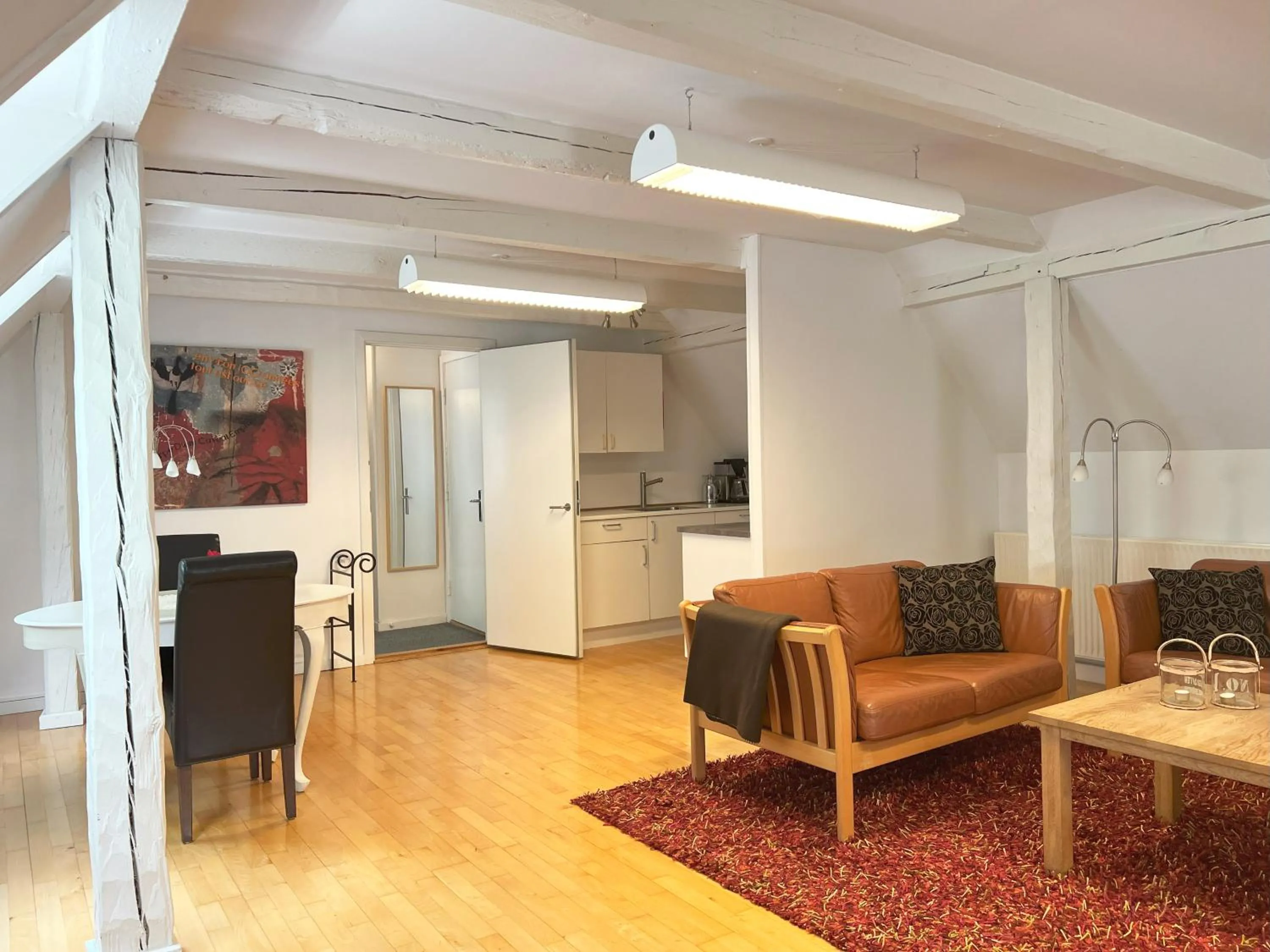 Living room in Skovridergaardens Ferielejligheder