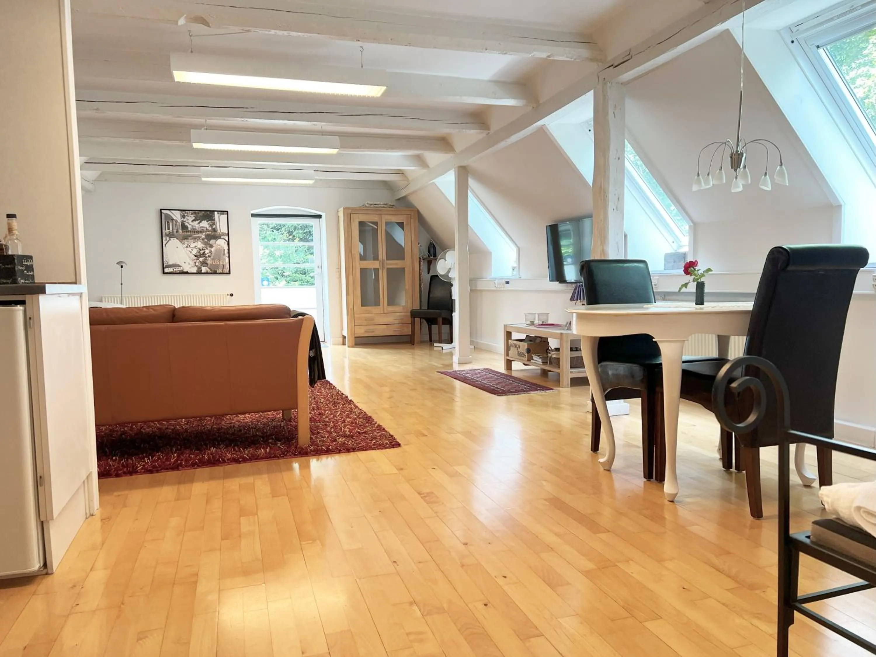 Living room in Skovridergaardens Ferielejligheder