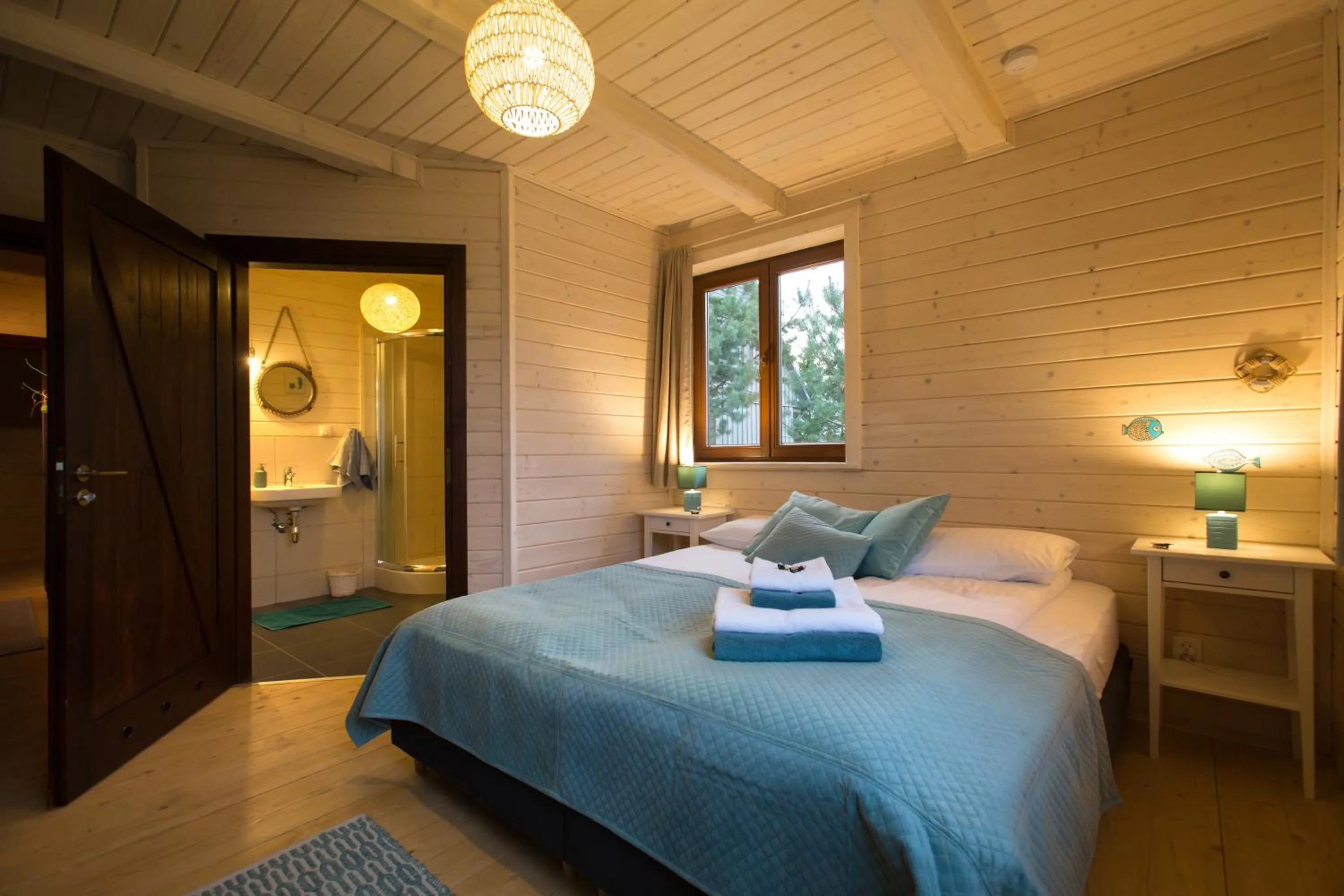 Bed in Sirvis Apartamenty