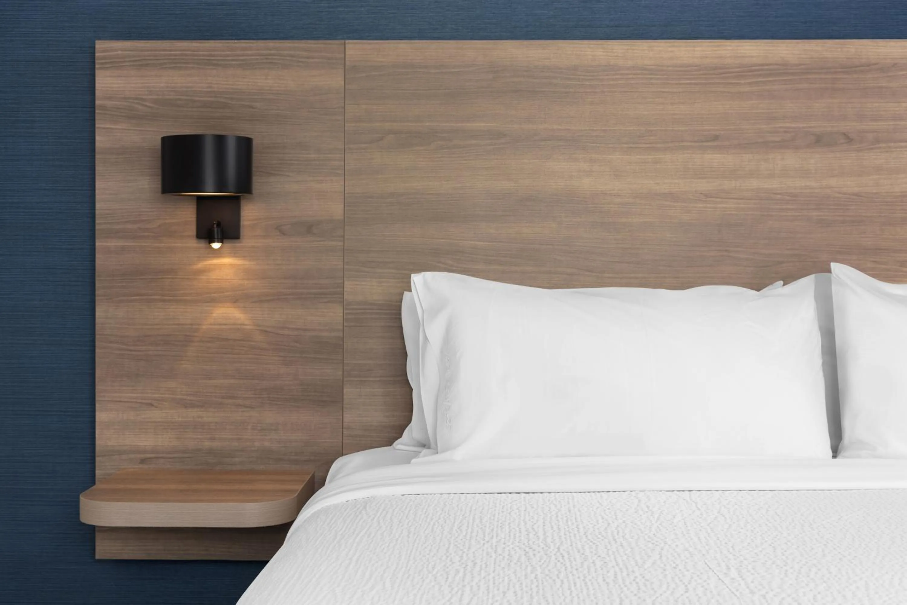 Bed in Holiday Inn Express Montreal Airport - St-Laurent by IHG