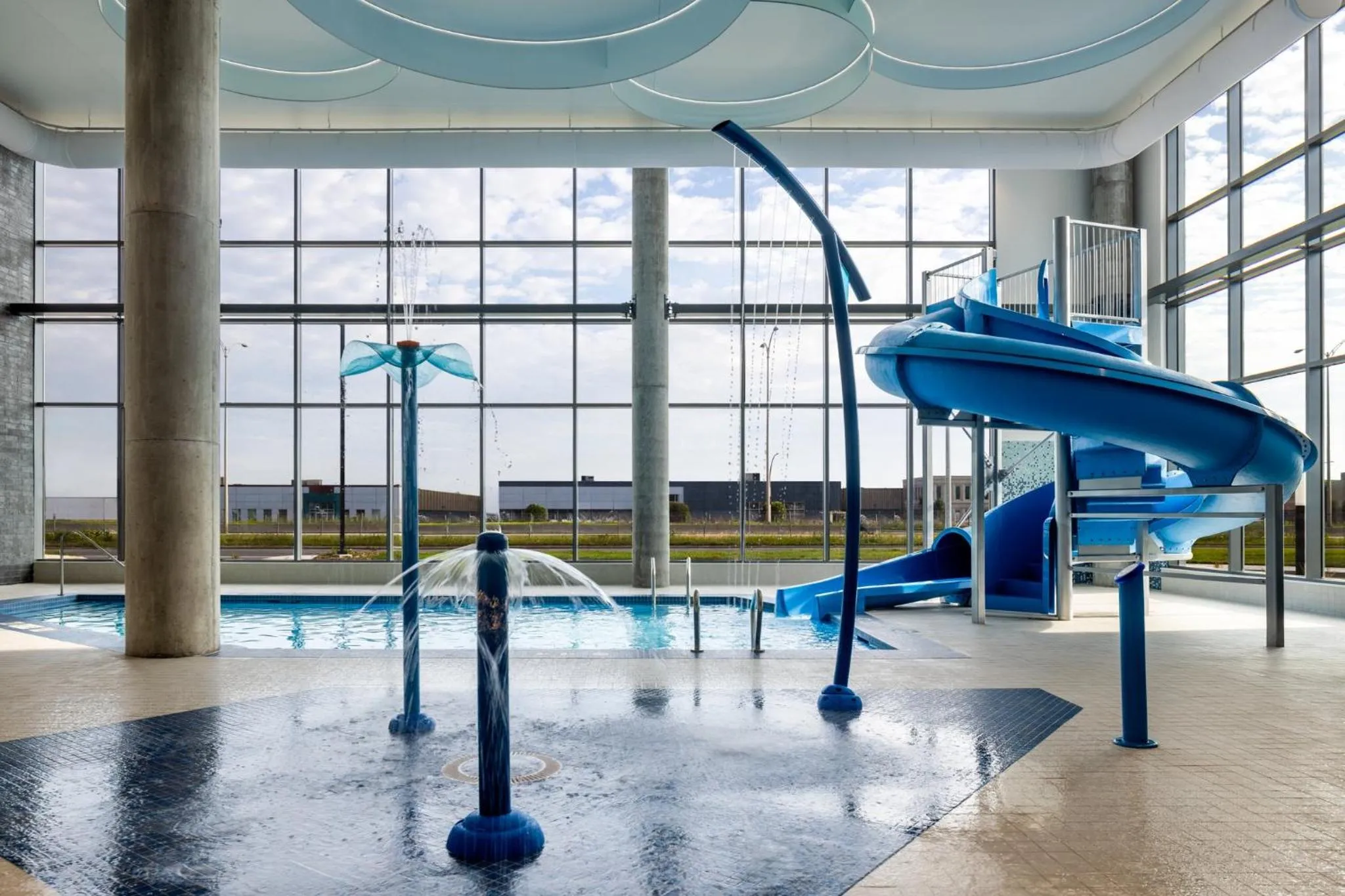 Swimming pool in Holiday Inn Express Montreal Airport - St-Laurent by IHG