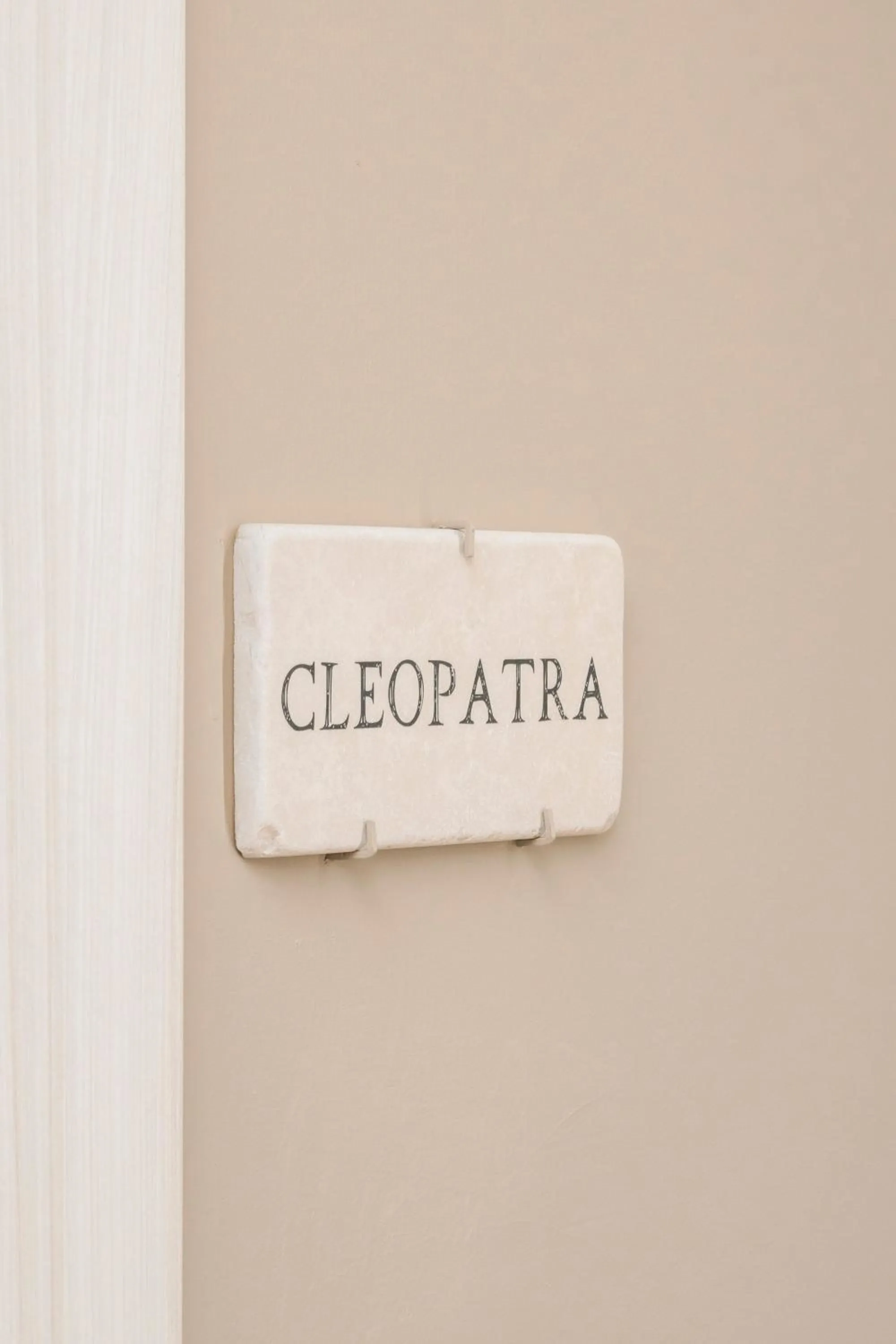 Logo/Certificate/Sign in The Roman Empire Guesthouse