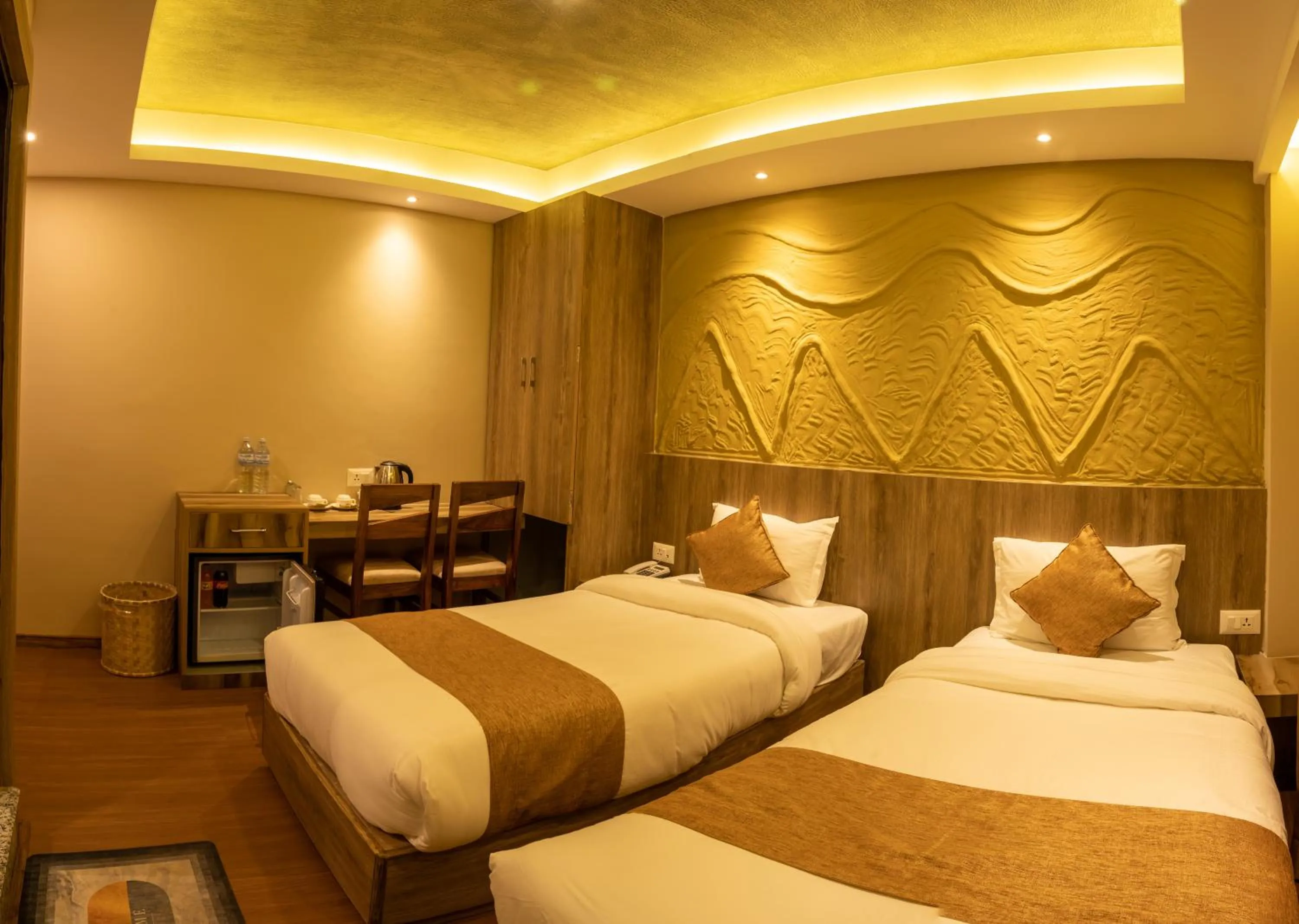 Bed in Divya Boutique Inn